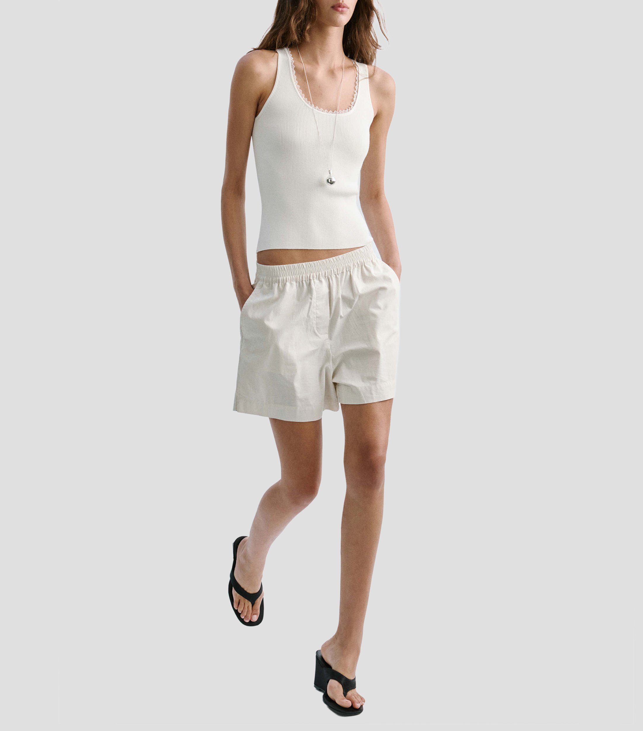 Top cuello redondo manga sin mangas liso Mujer