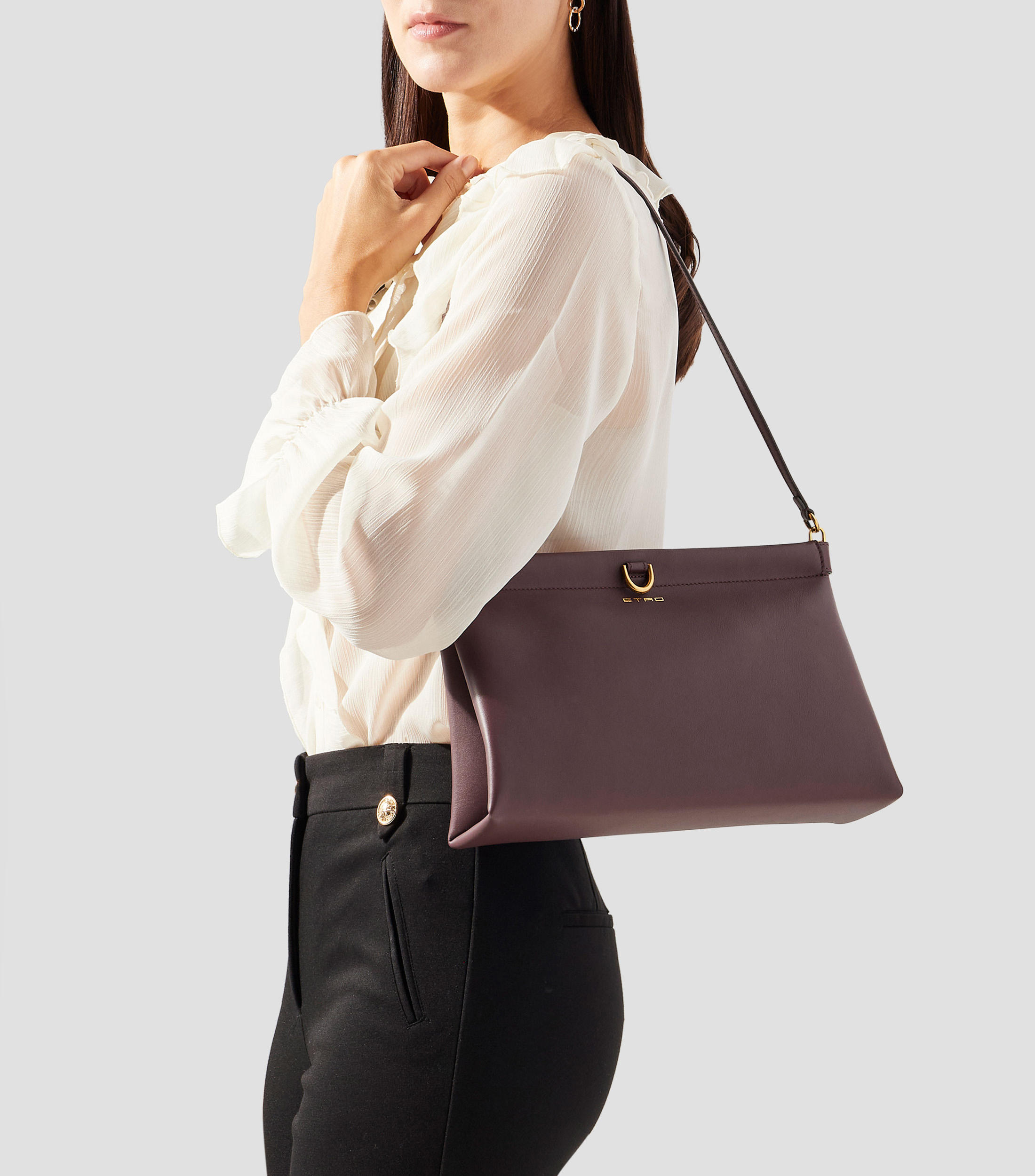 Bolsa Clutch en piel vacuna Talk lisa Mujer