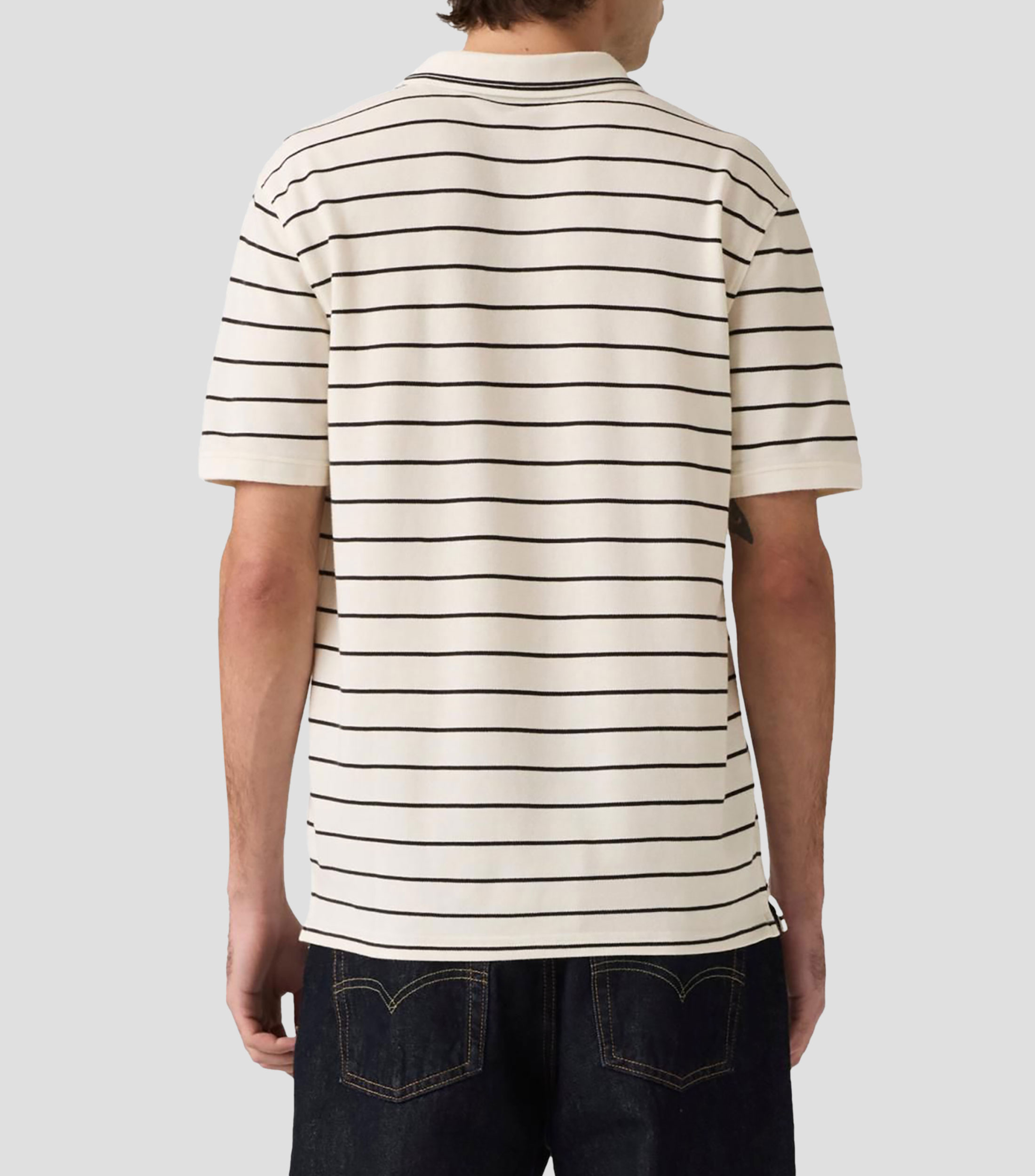 Playera tipo polo manga corta a rayas Hombre