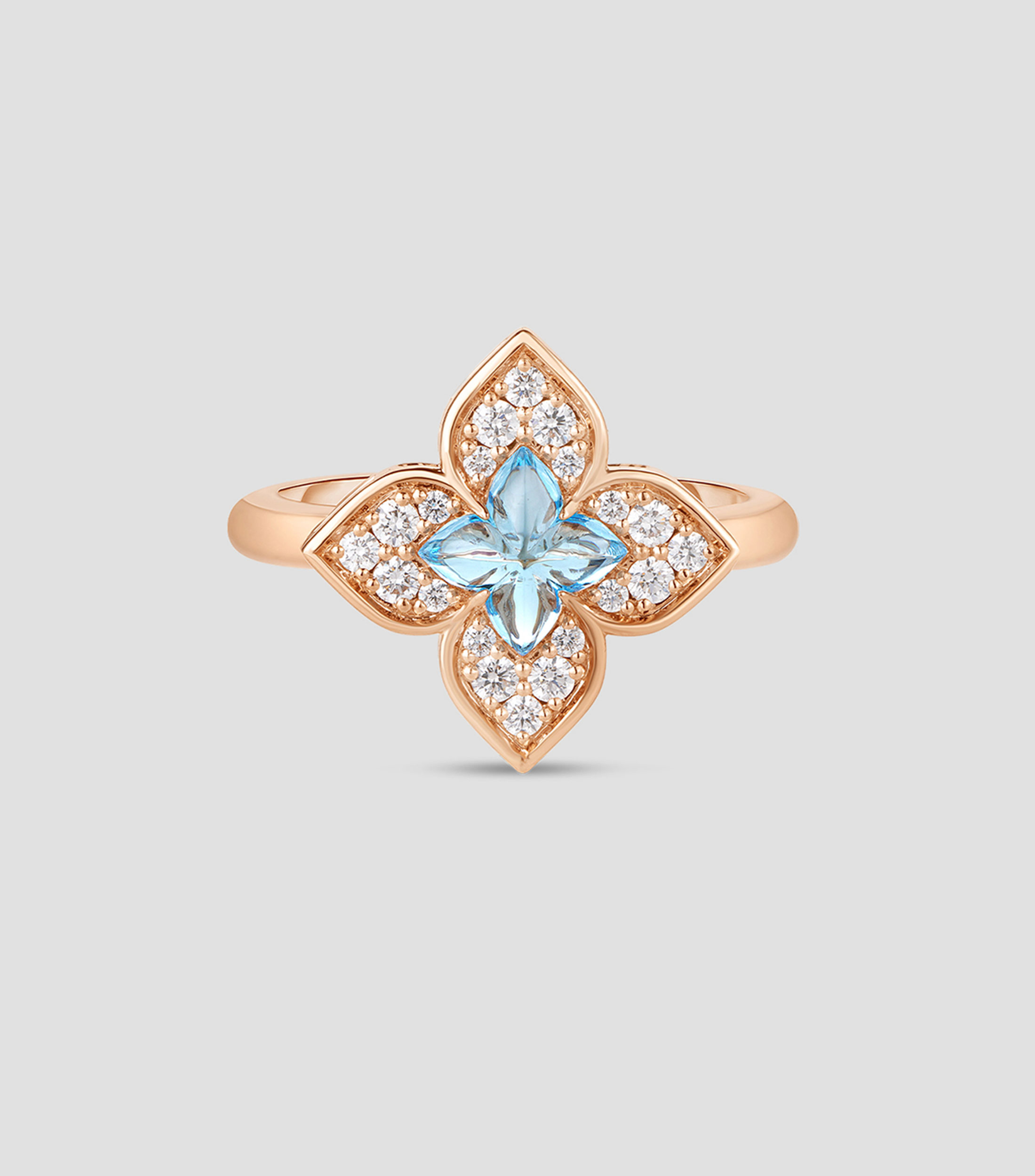 Anillo en oro rosa 18 Kilates con diamantes y topacio Mujer
