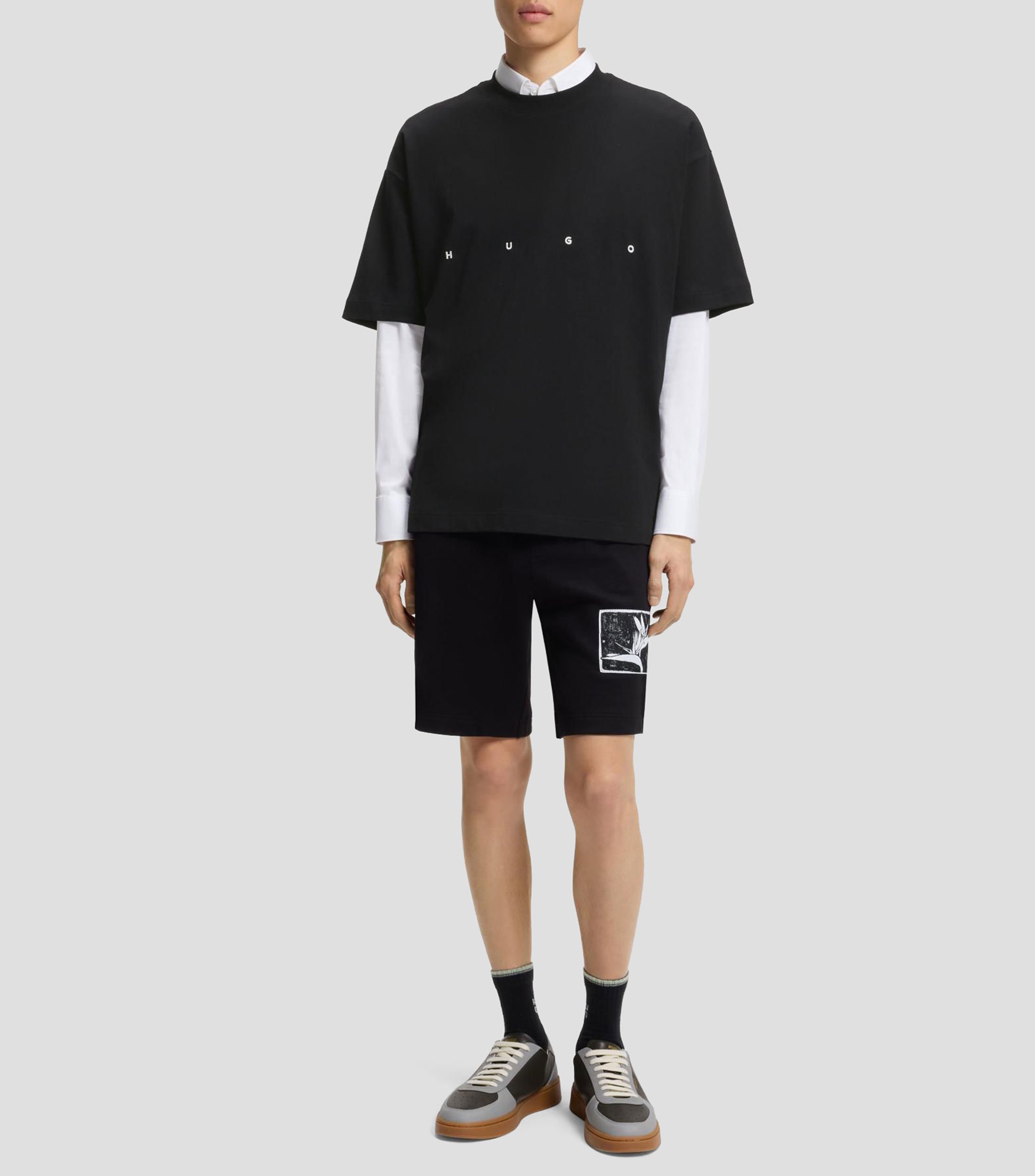 Playera amplia de algodón con llamativo logo estampado Hombre