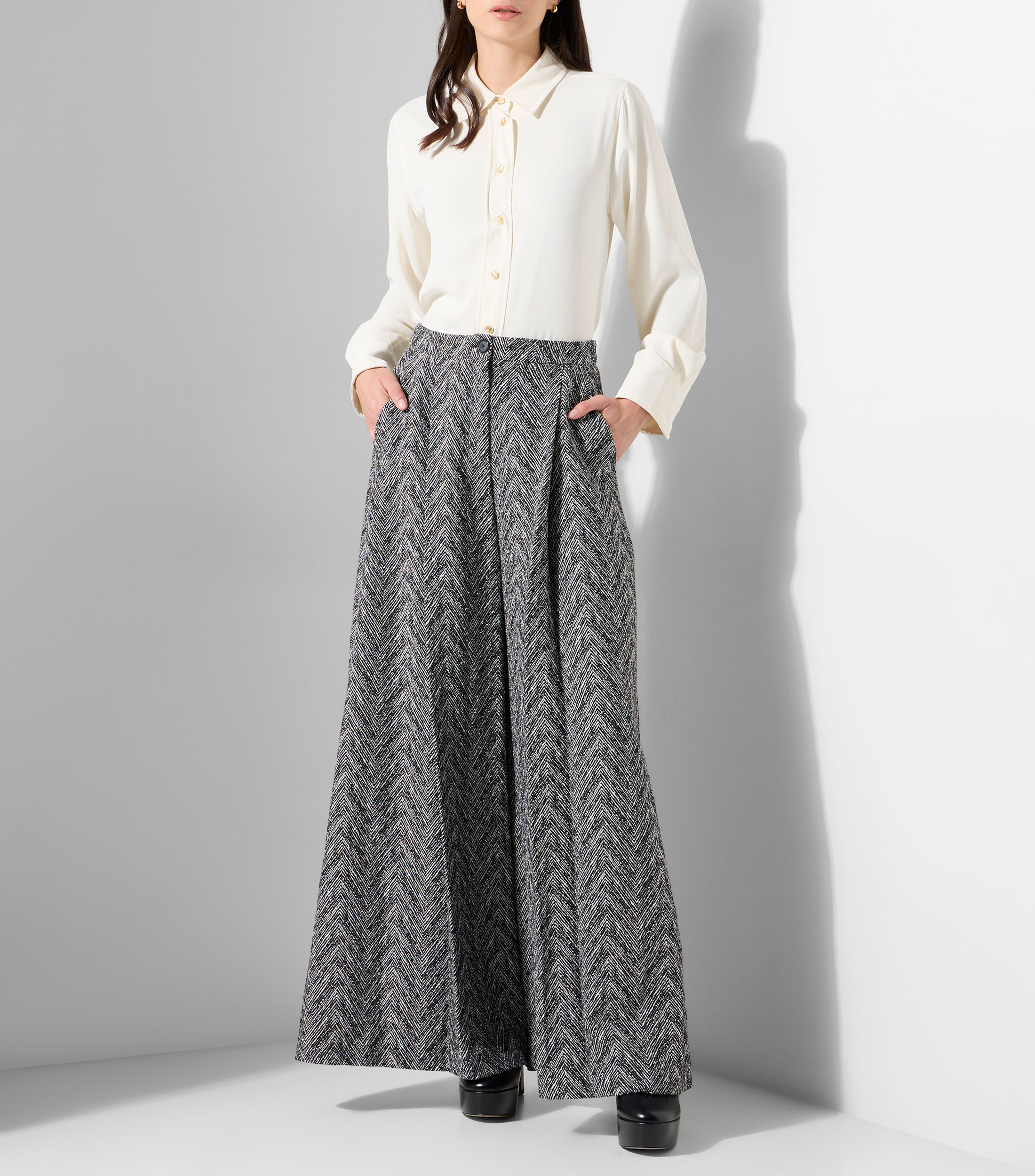 Pantalones regular fit de pernera ancha en tweed de espiga Mujer