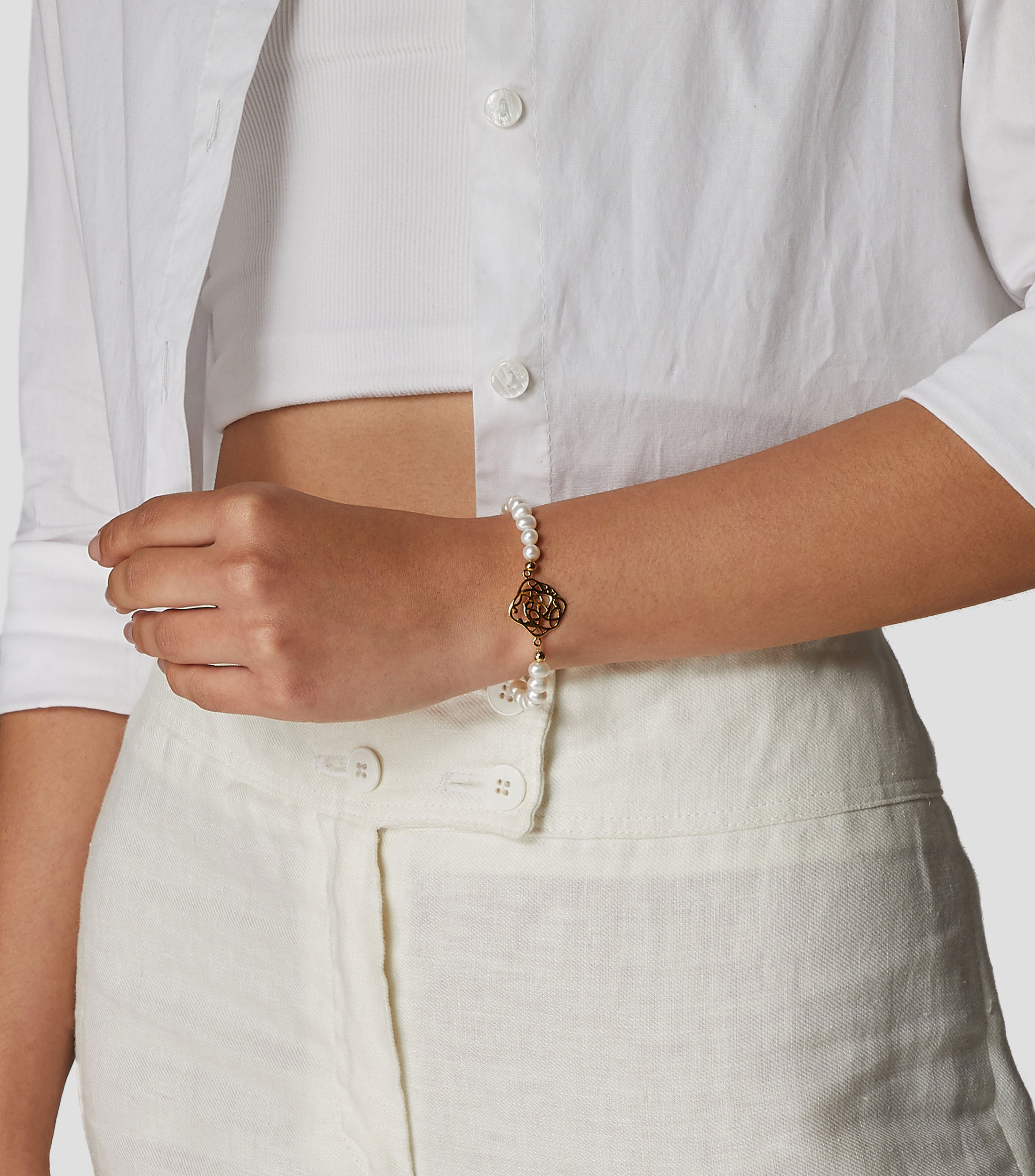 Pulsera elastica con perlas Mujer