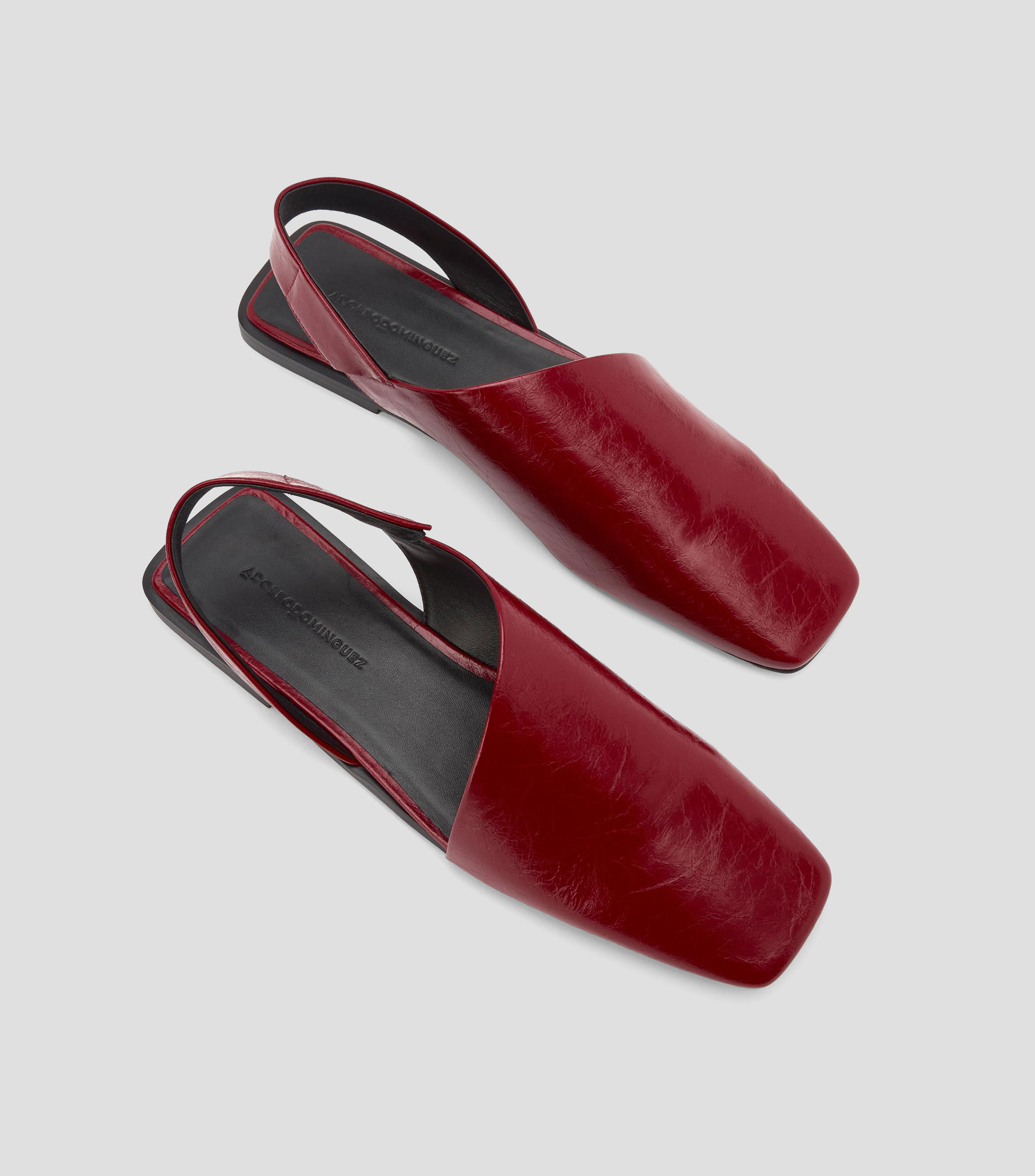 Sandalias planas en piel Mujer