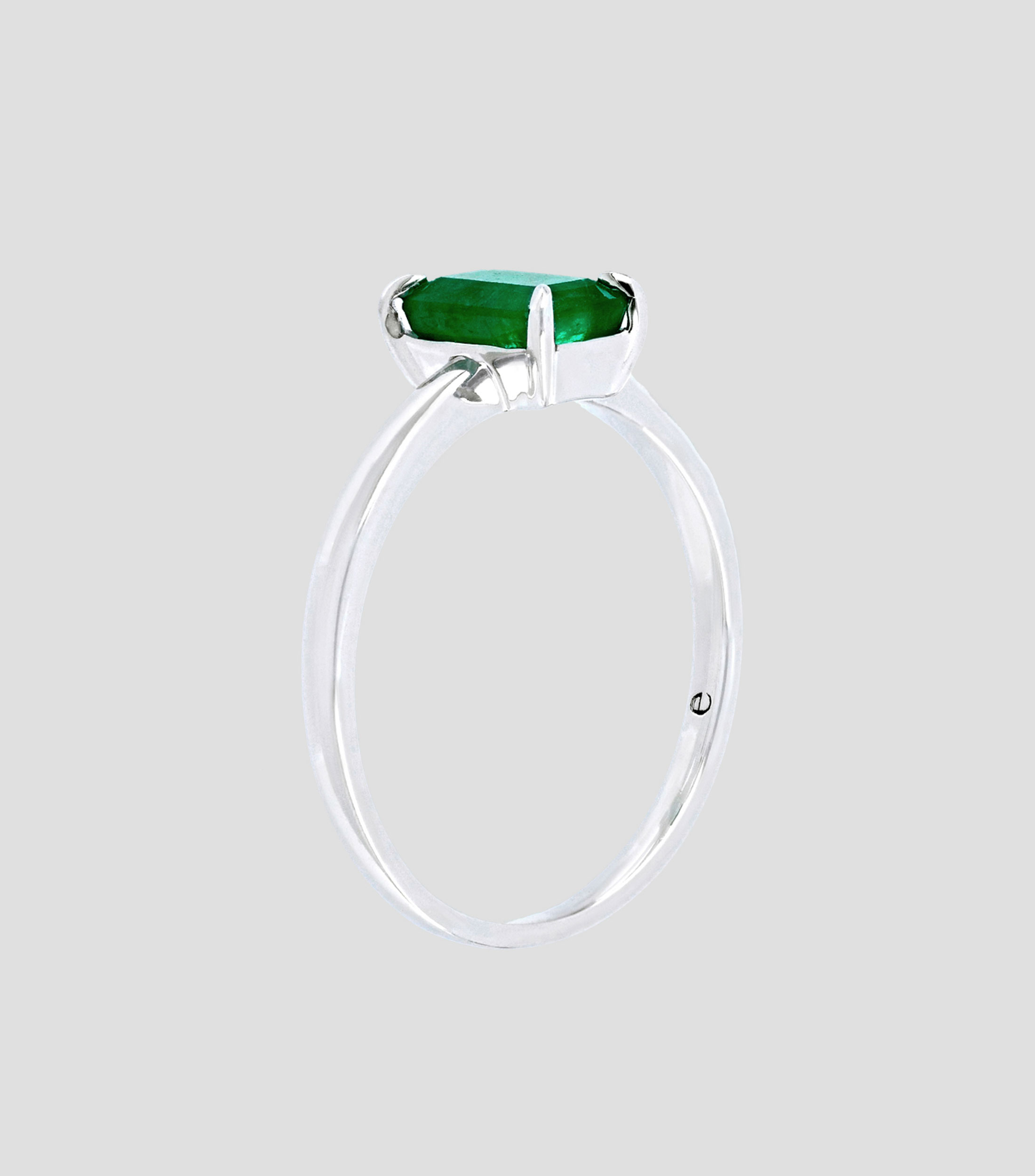 Anillo de compromiso en oro blanco 18 Kts con esmeralda Mujer