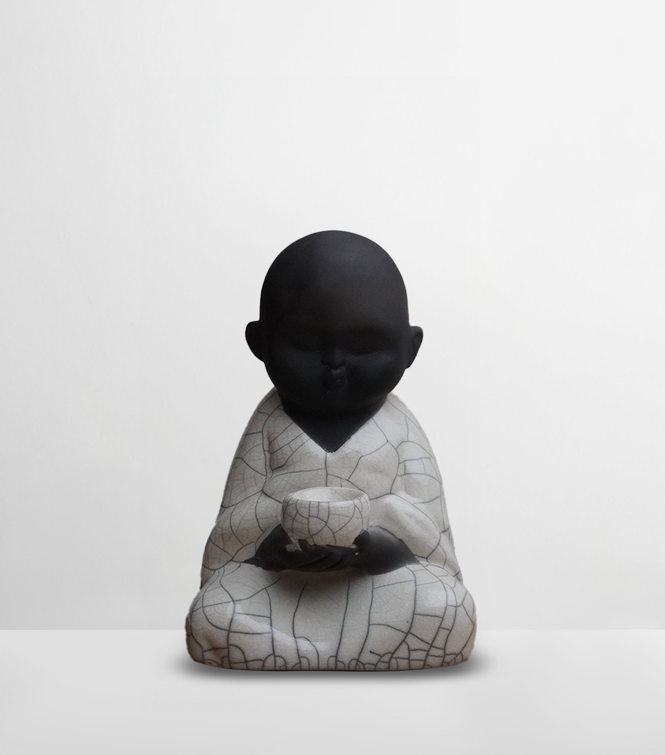 Escultura Baby Buda en cerámica