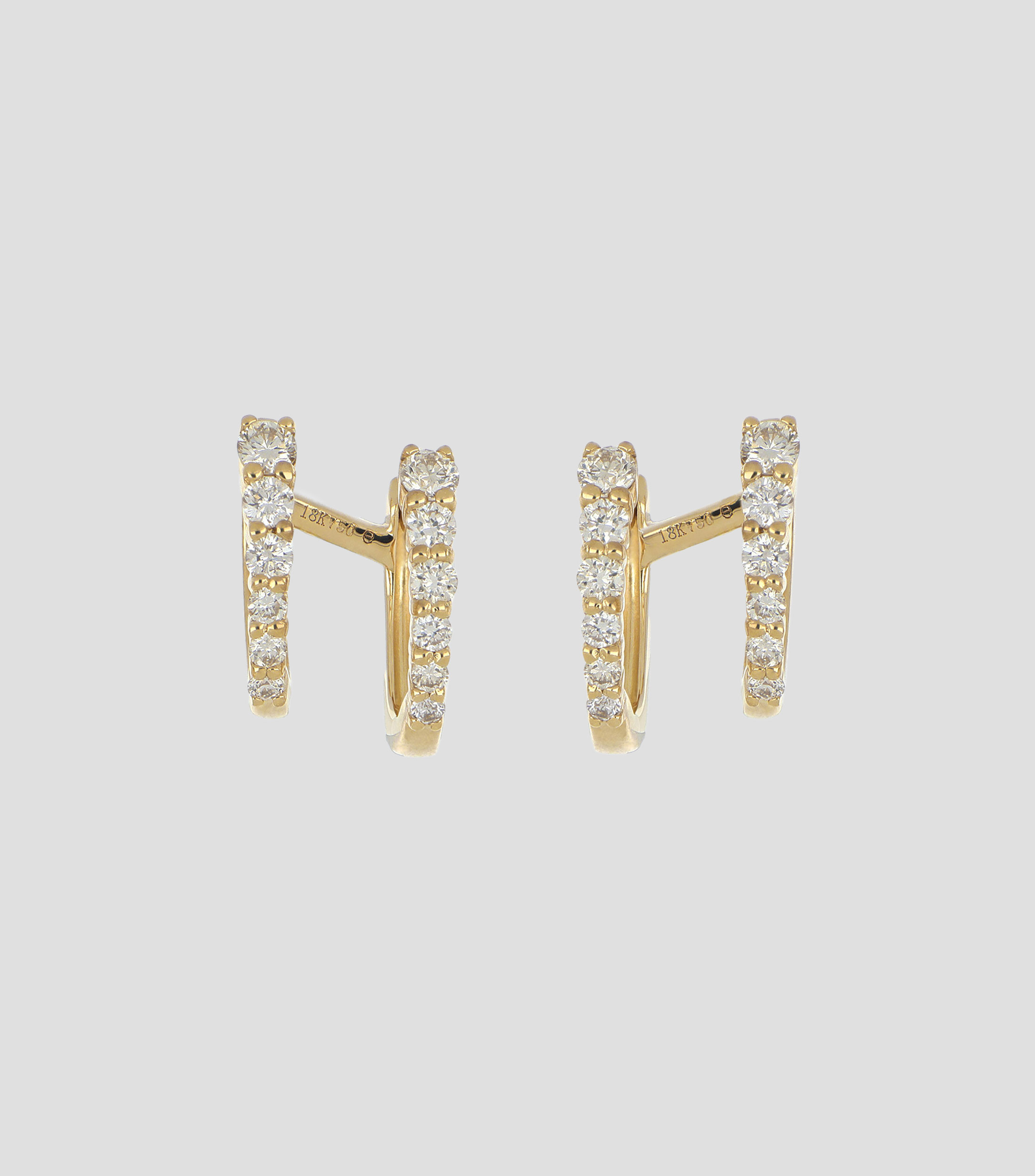 Aretes en oro amarillo de 18 kilates con diamantes Mujer