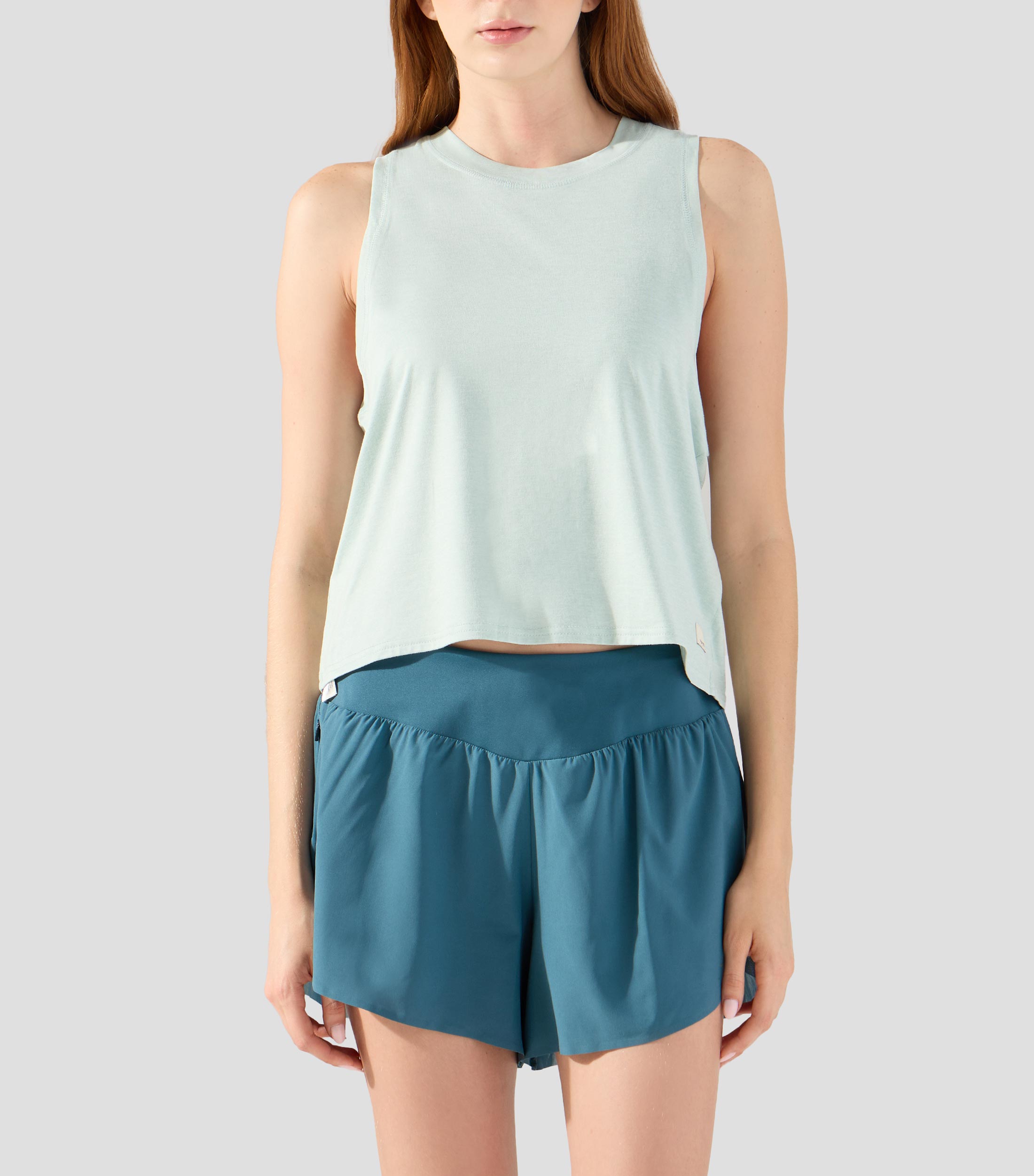 Playera de entrenamiento cuello redondo sin mangas lisa Mujer