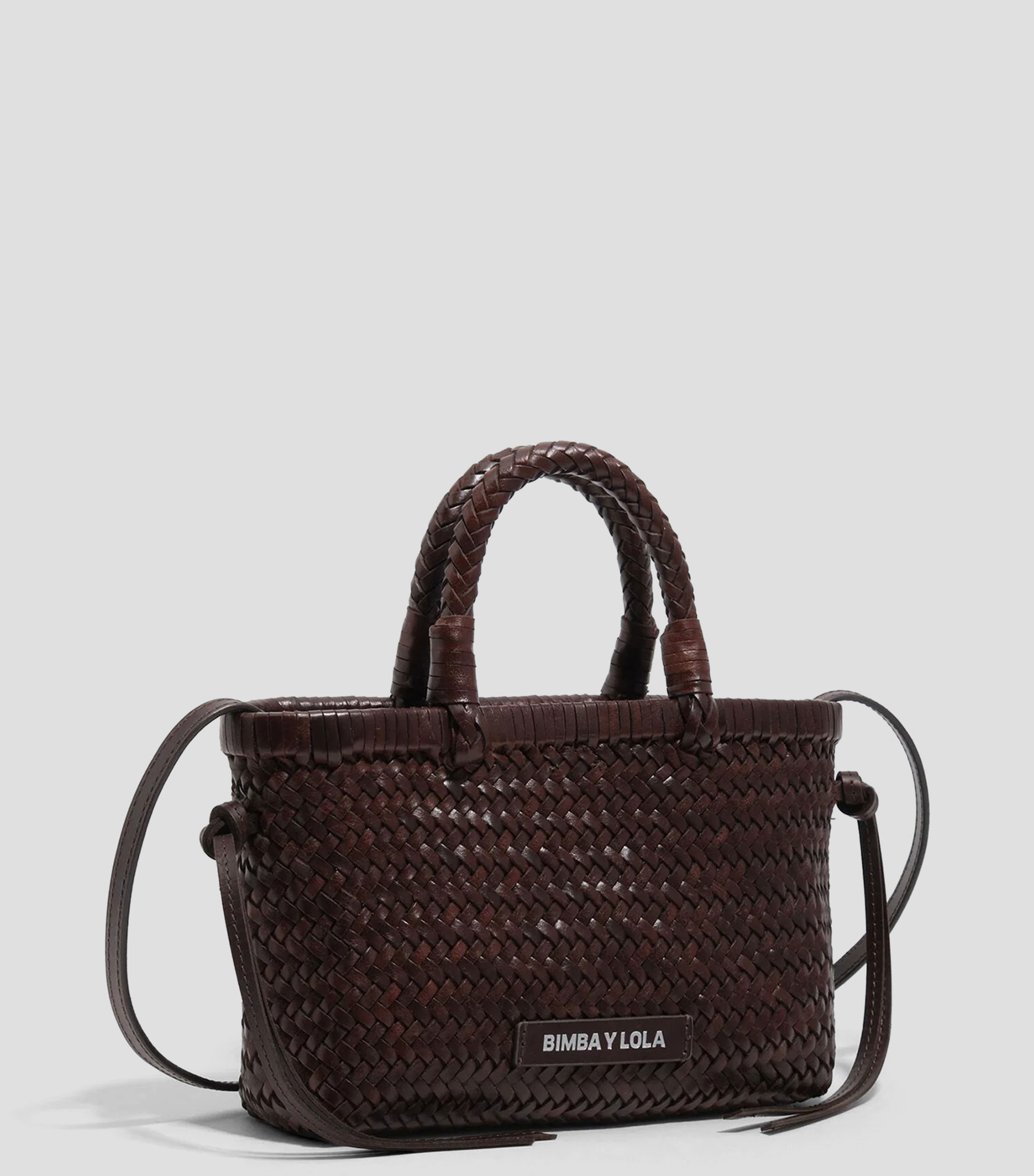 Bolsa mini trenzada en piel Mujer