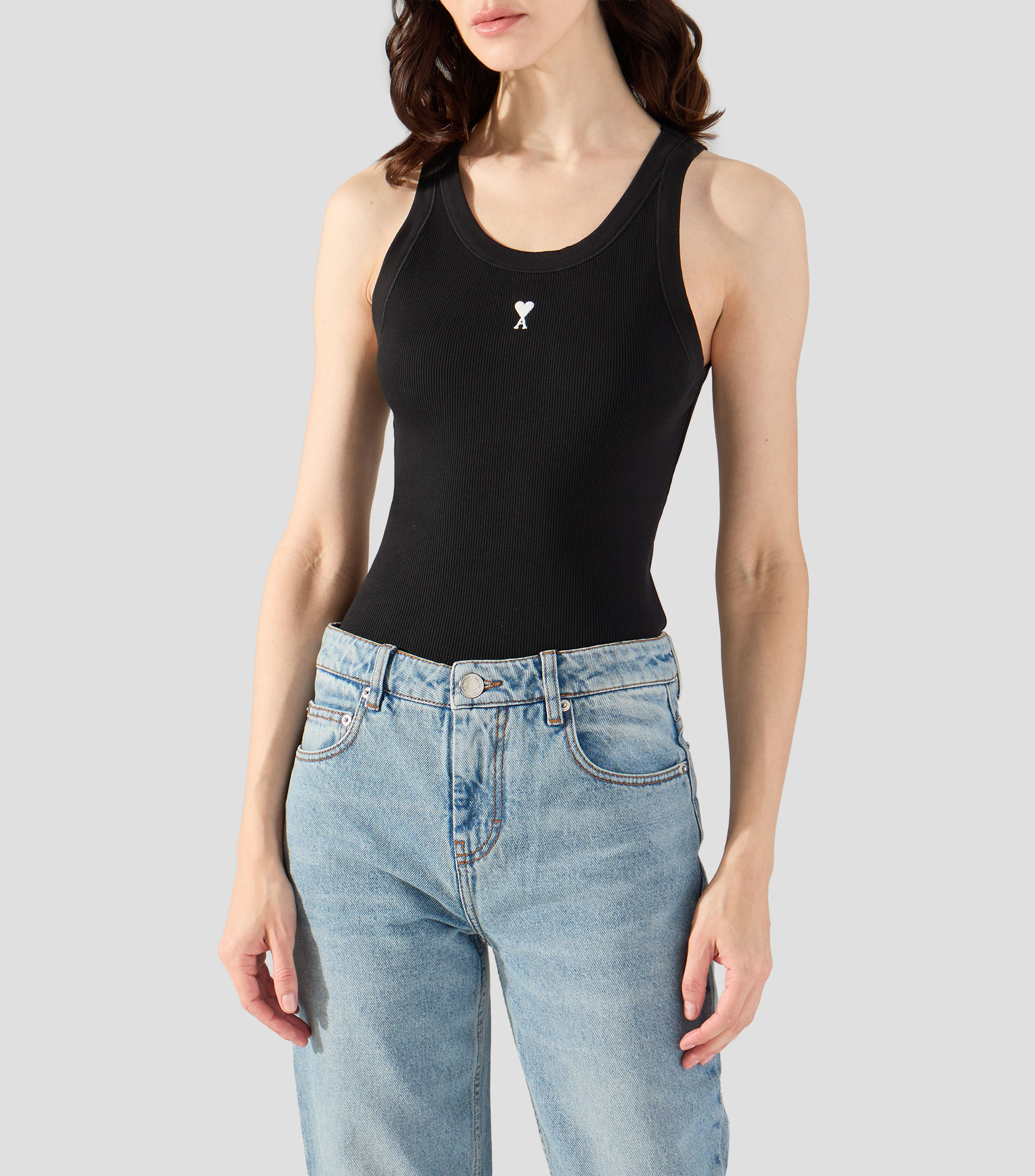 Playera cuello redondo sin mangas lisa Mujer
