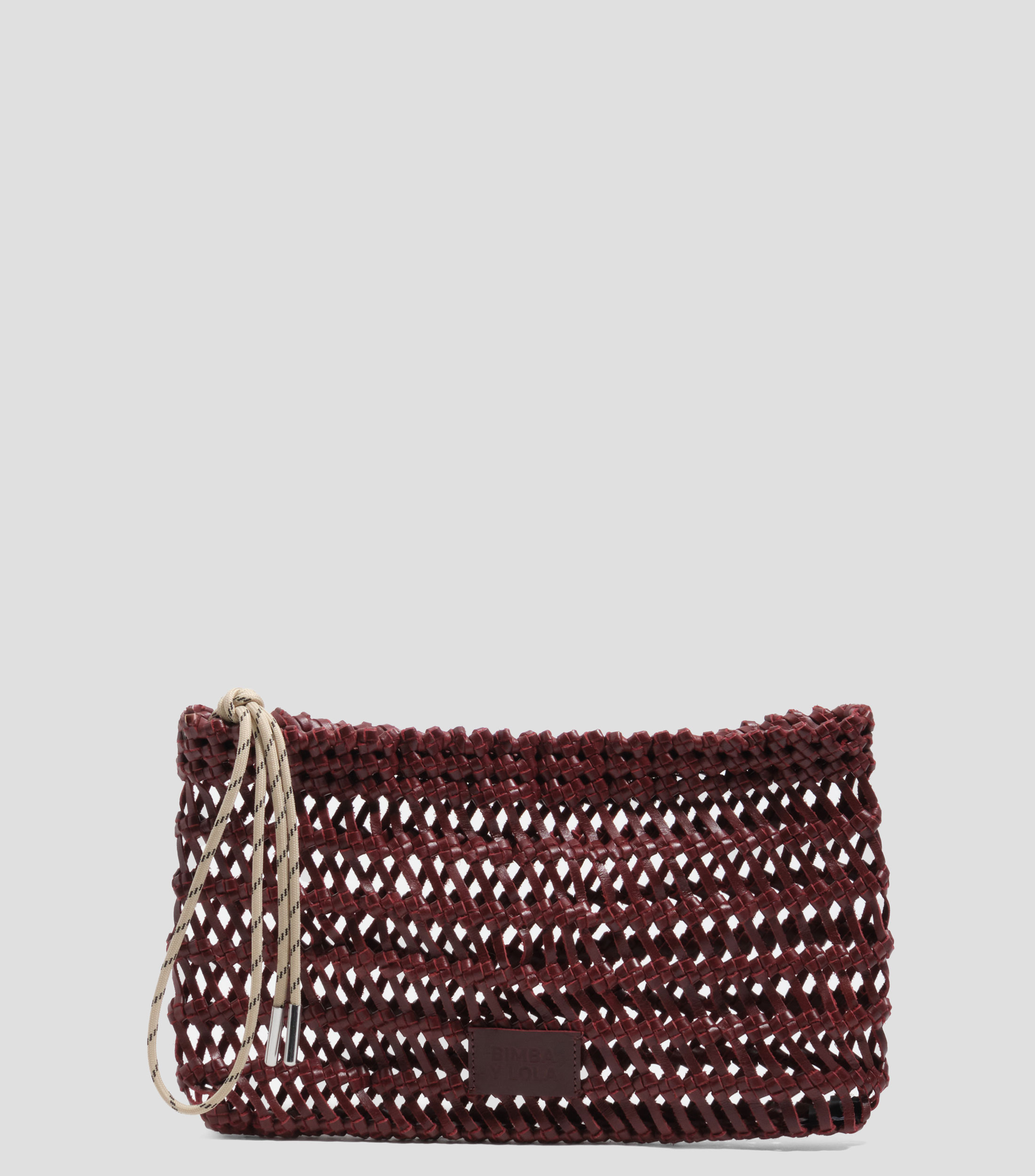 Bolsa de mano en piel vacuna con microdiseño trenzado Mujer