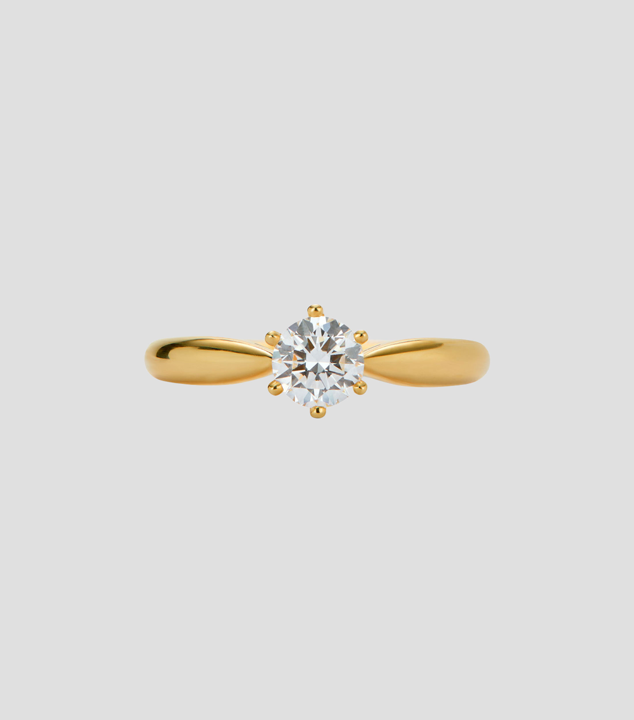 Anillo solitario en oro amarillo de 18 kilates con diamantes Mujer