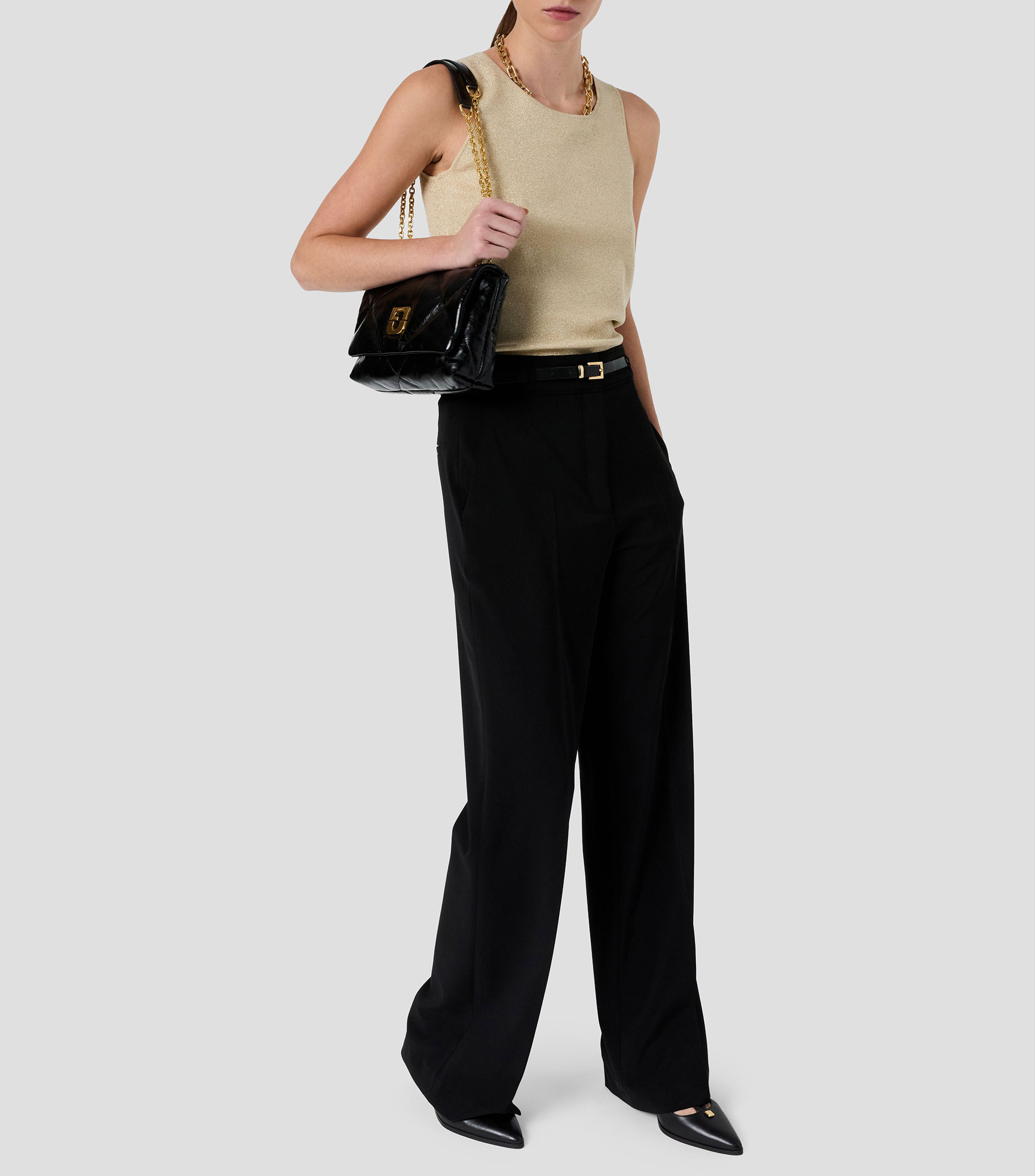 Blusa lisa sin mangas Mujer