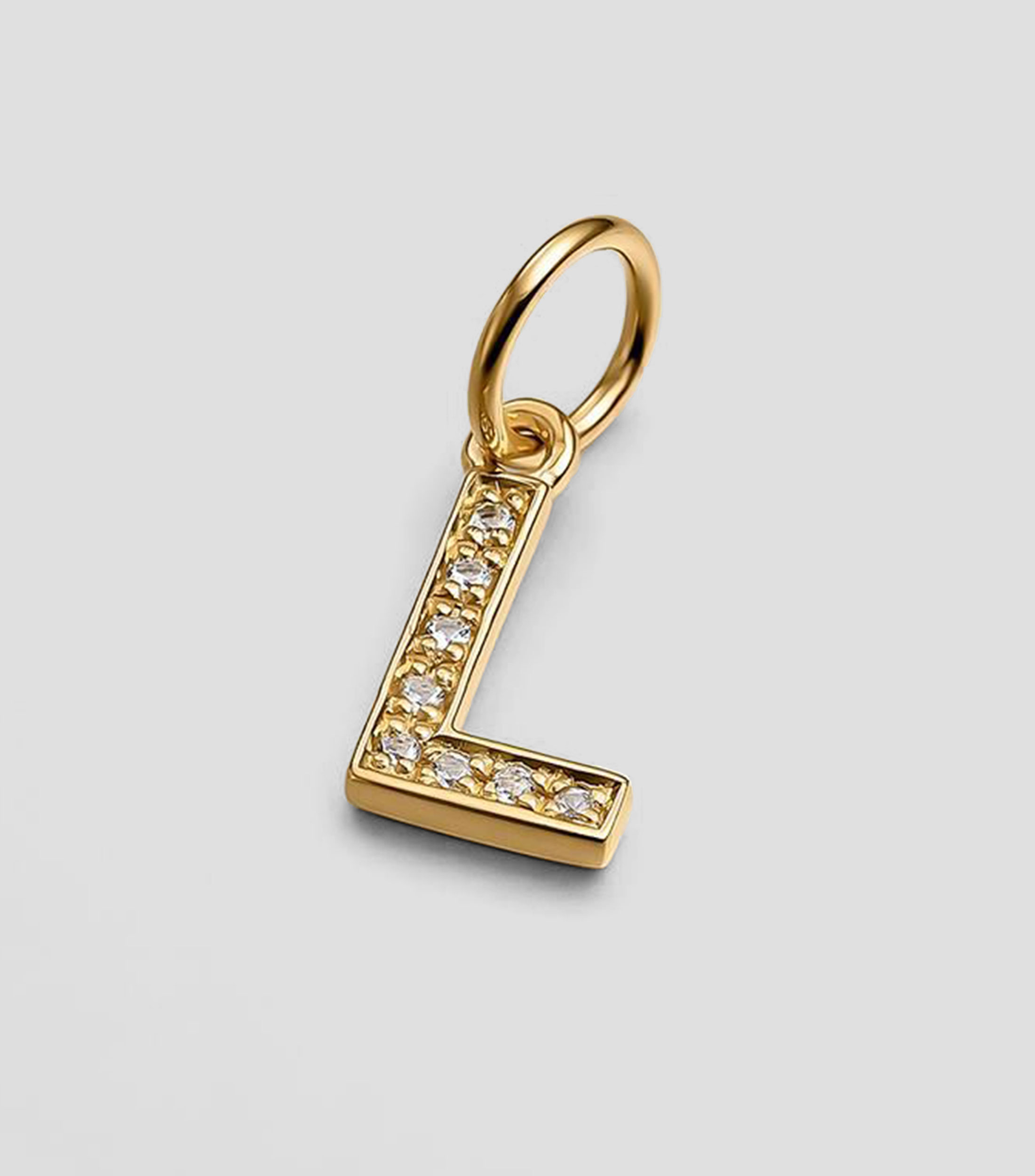 Charm letra "L" en plata .925 con topacio blanco Mujer
