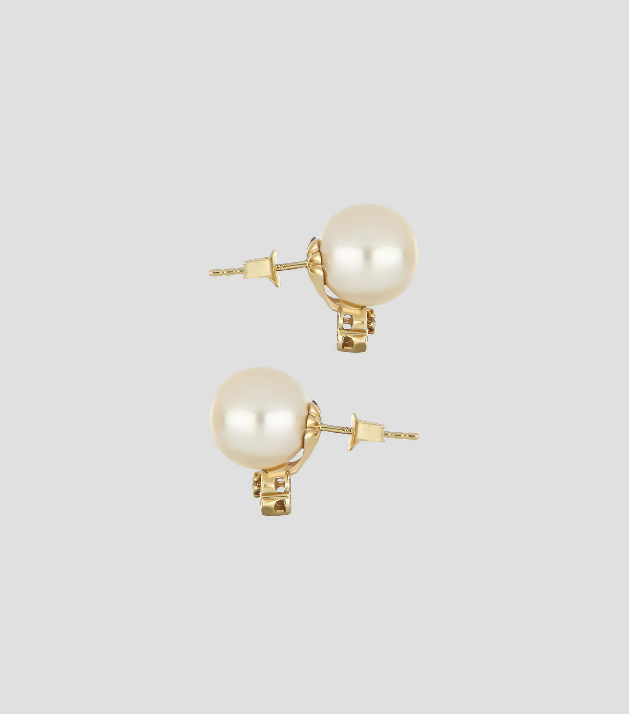 Aretes en oro amarillo de 14 kilates con perla Mujer