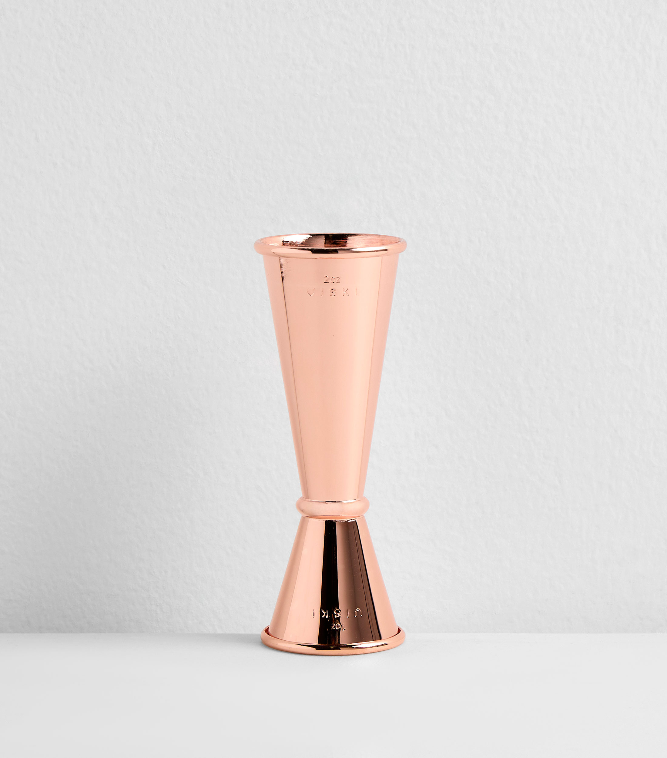 Jigger en Bronce