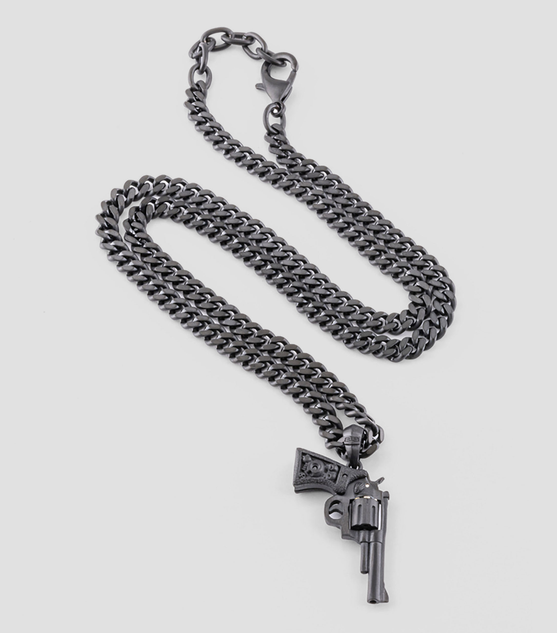 Cadena con dije de pistola Hombre
