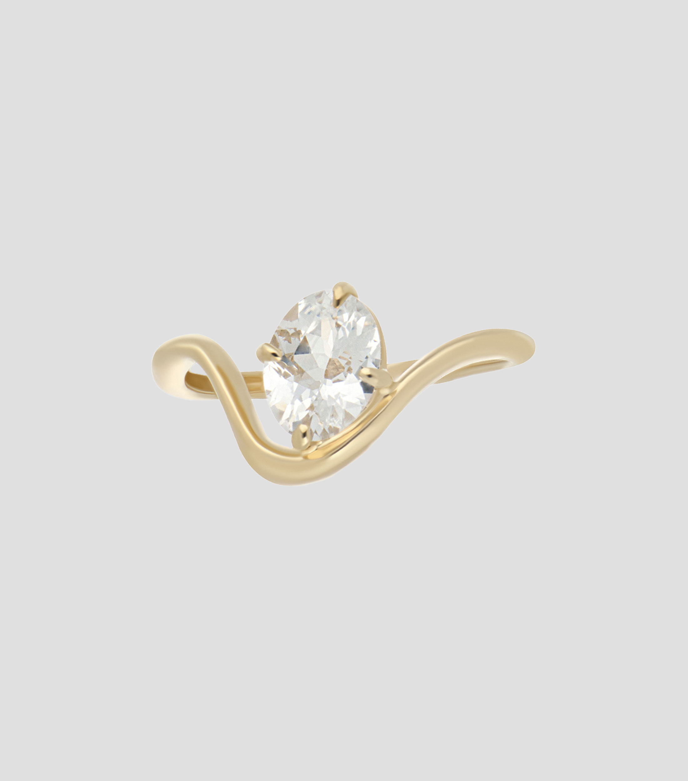 Anillo en oro amarillo de 18 Kilates con zafiro blanco Mujer
