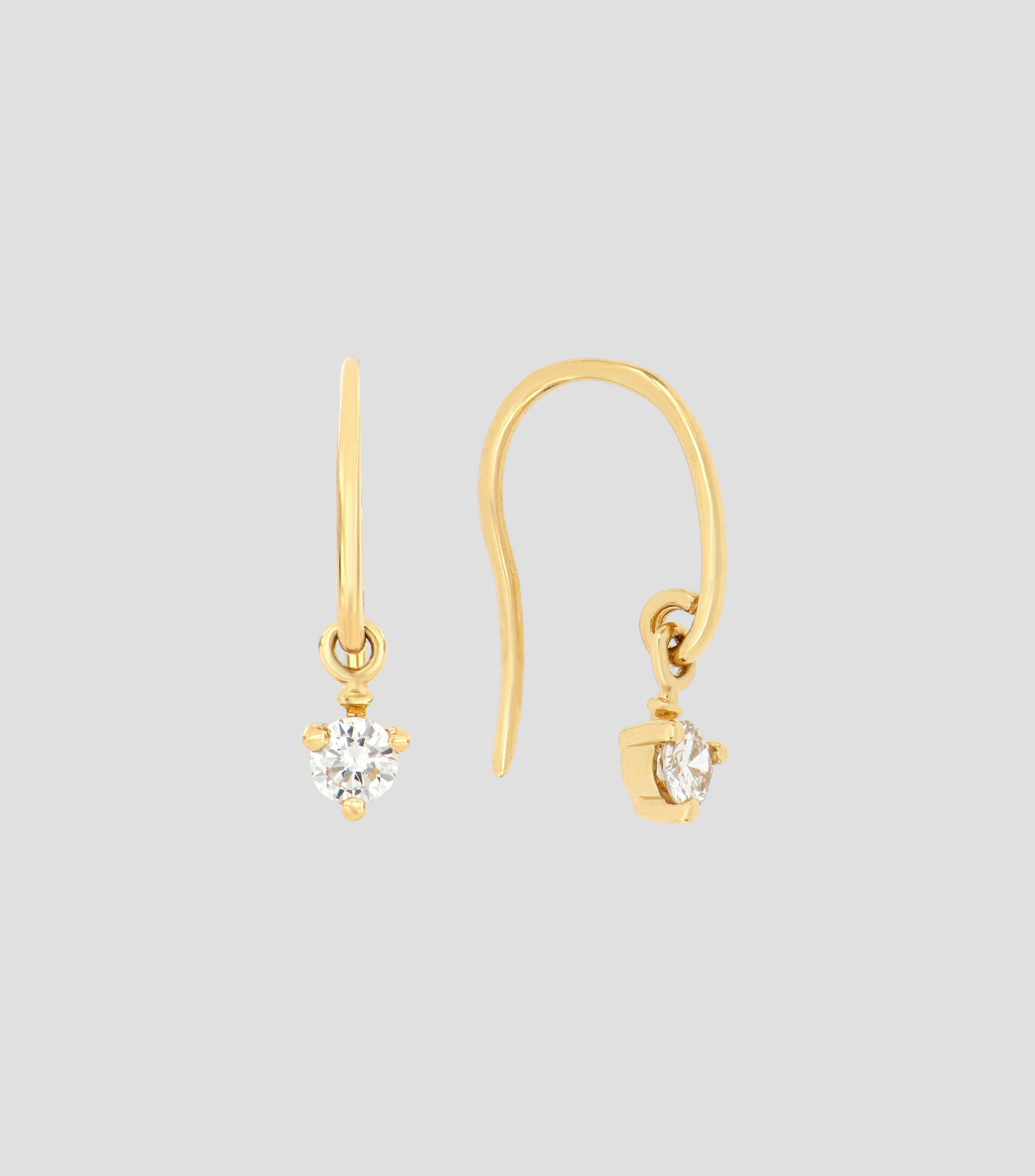 Aretes en oro amarillo de 18 Kts con diamante Mujer