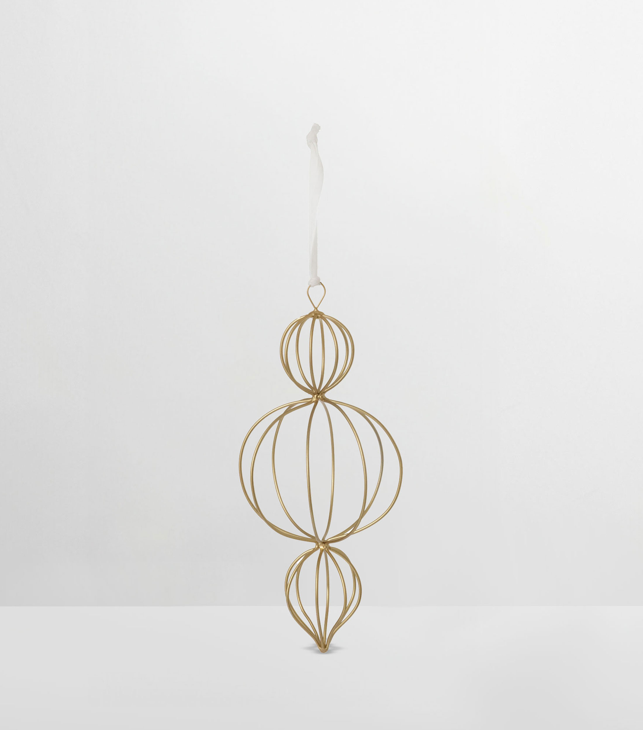 Ornamento silueta chirimbolo en Metal