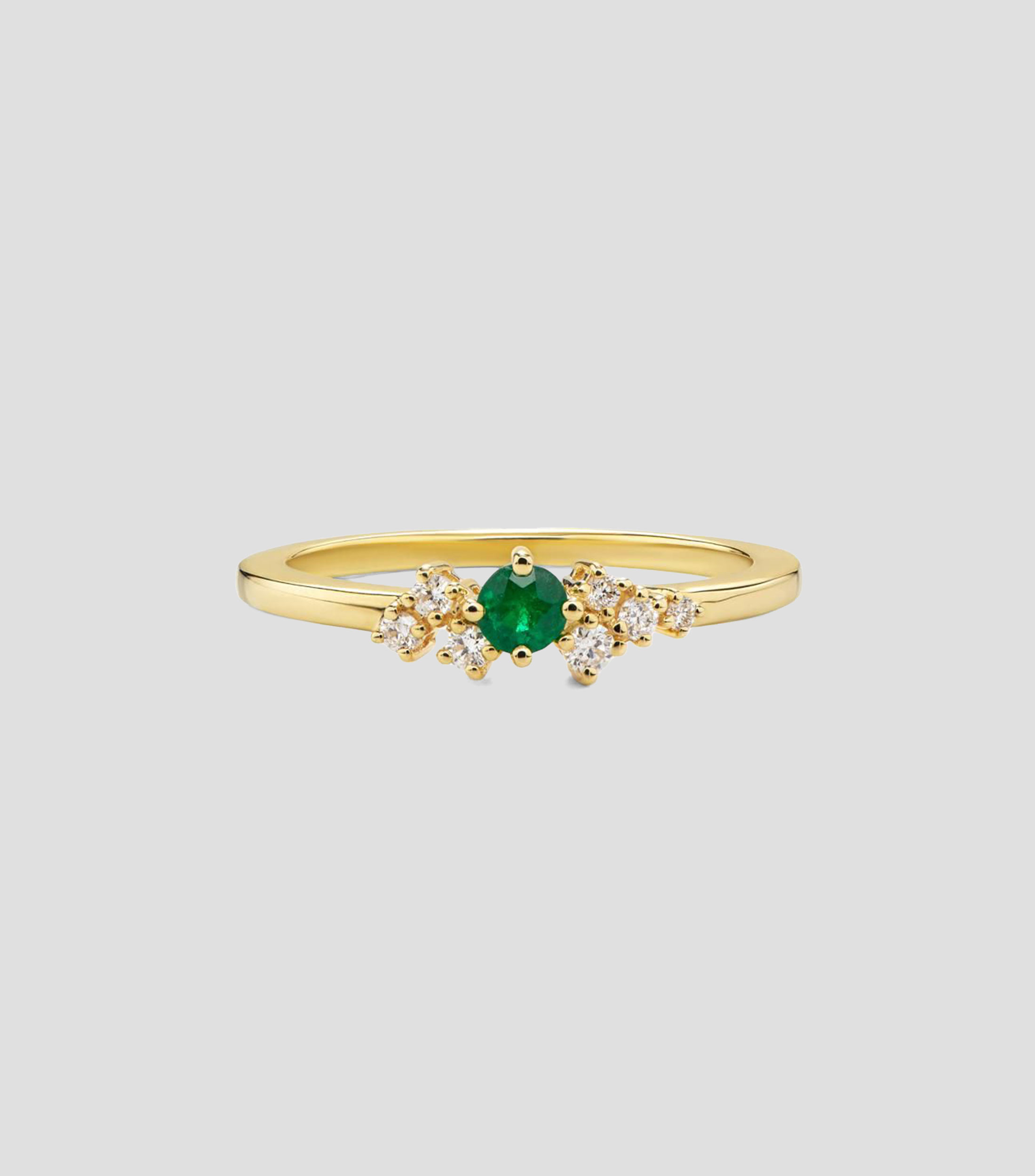 Anillo en Oro amarillo de 18 Kilates con esmeralda y diamantes Mujer