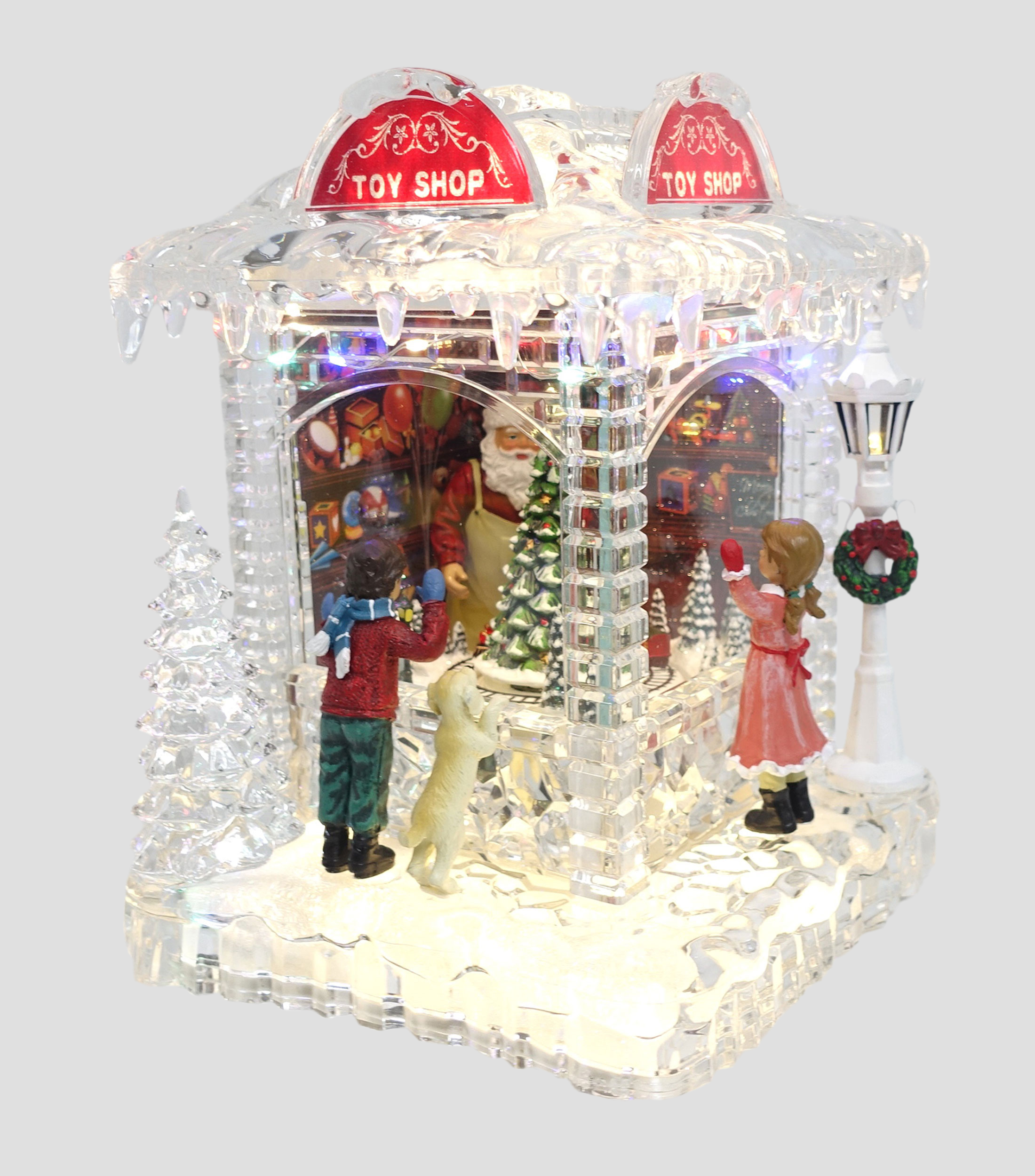 Figura decorativa Navideña Tienda de Juguetes con luz y música
