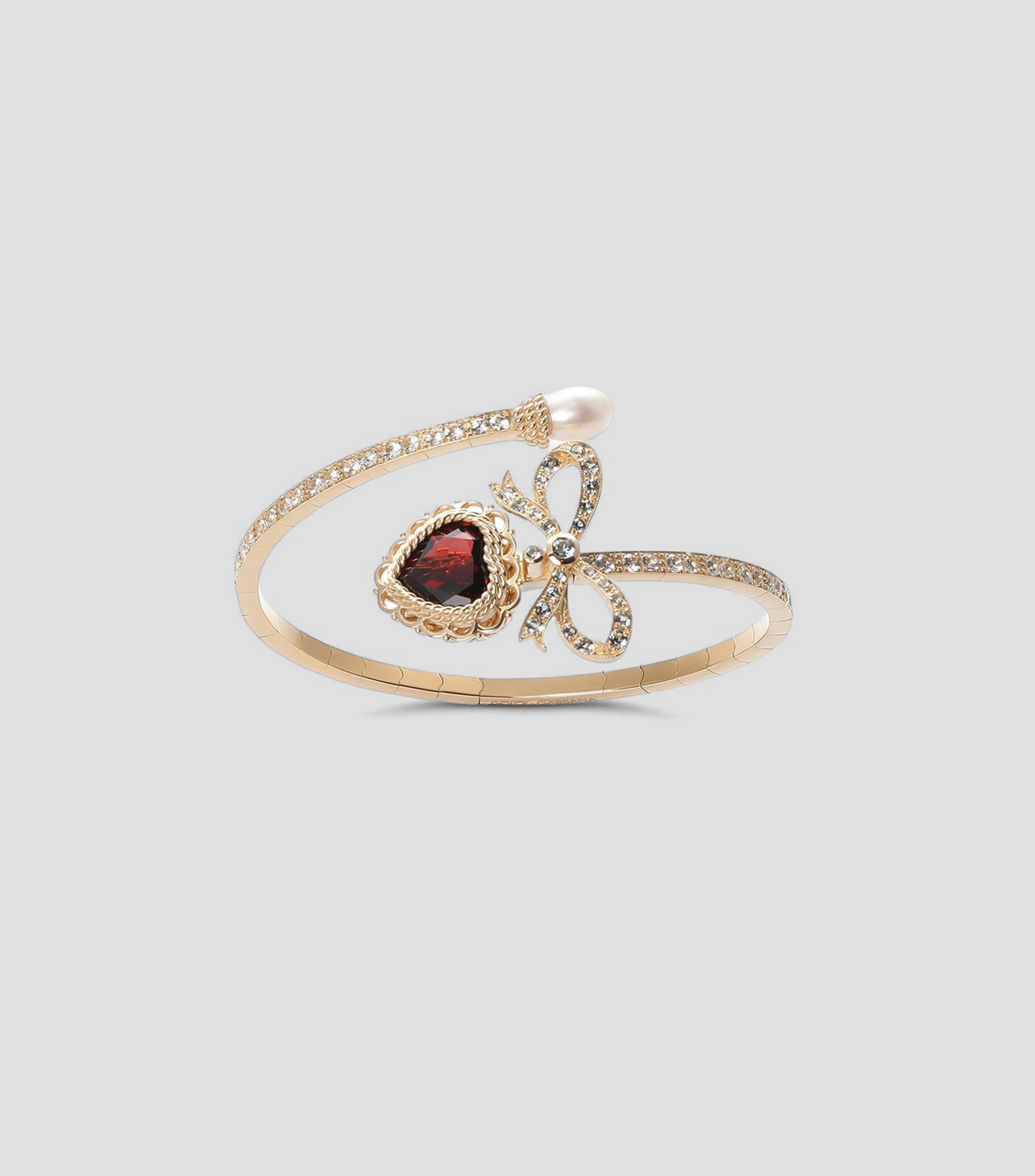 Pulsera en Oro amarillo de 18 Kilates con Granate rodolita, zafiros y perla de agua Mujer