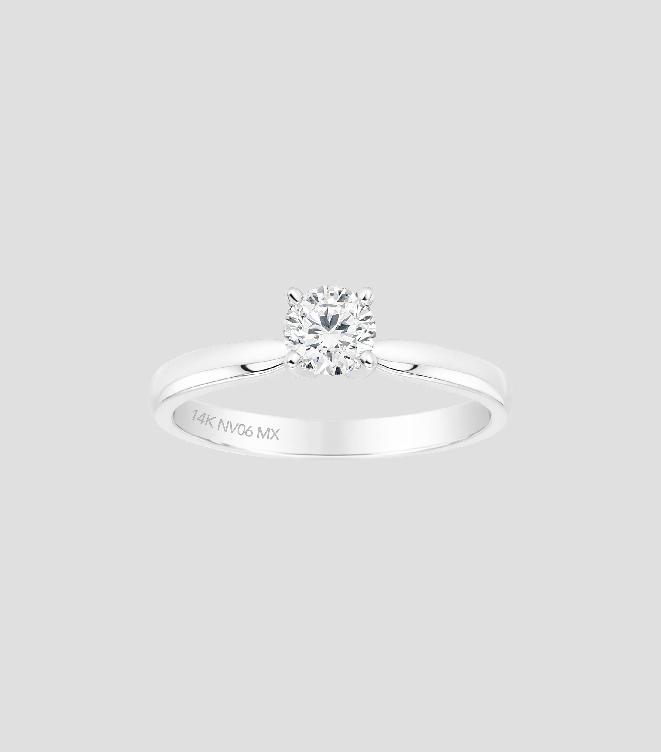 Anillo solitario en oro amarillo 14 Kilates con brillante en el medio Mujer