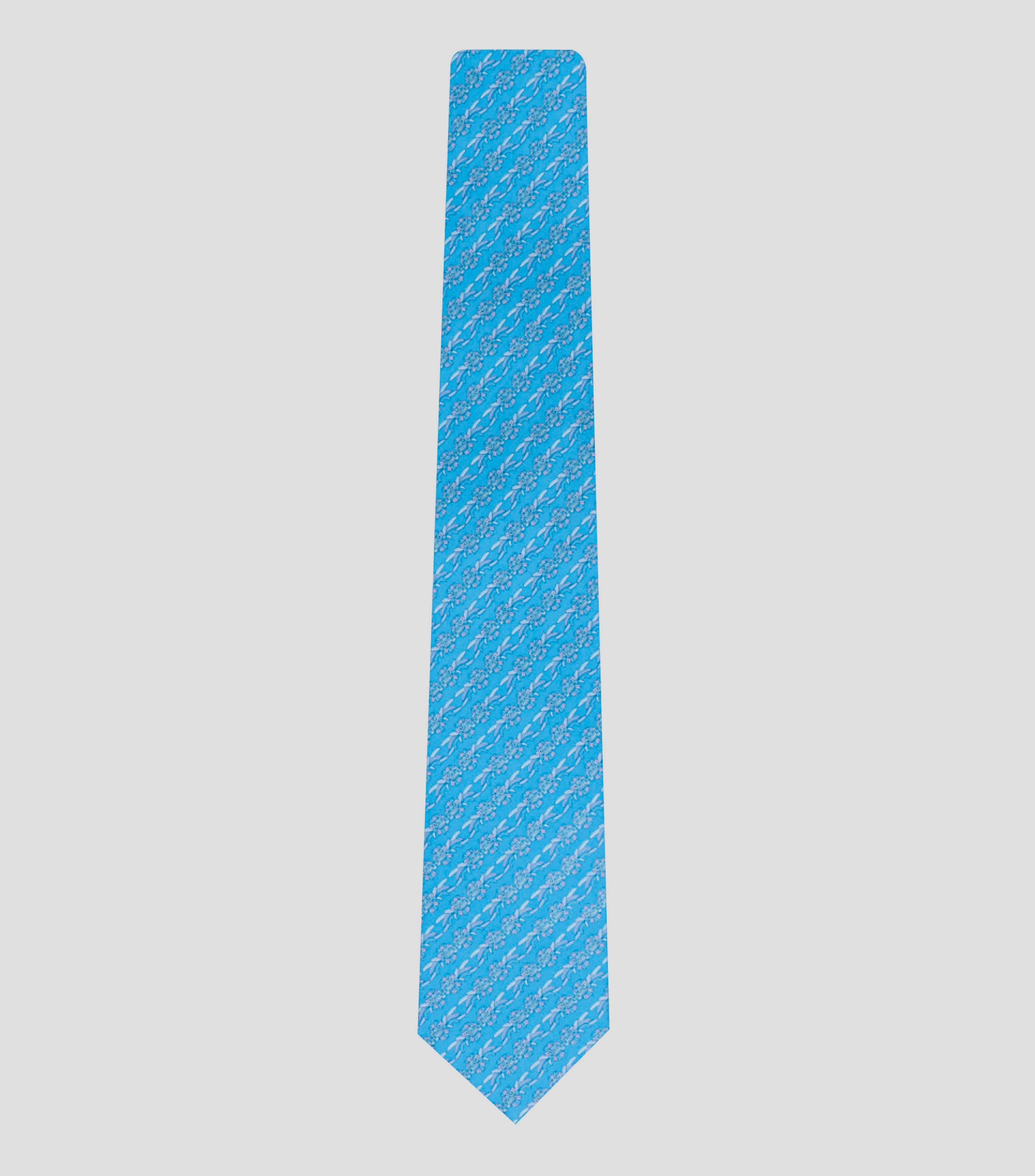 Corbata ancha en seda azul claro estampada Quetzalcóatl
