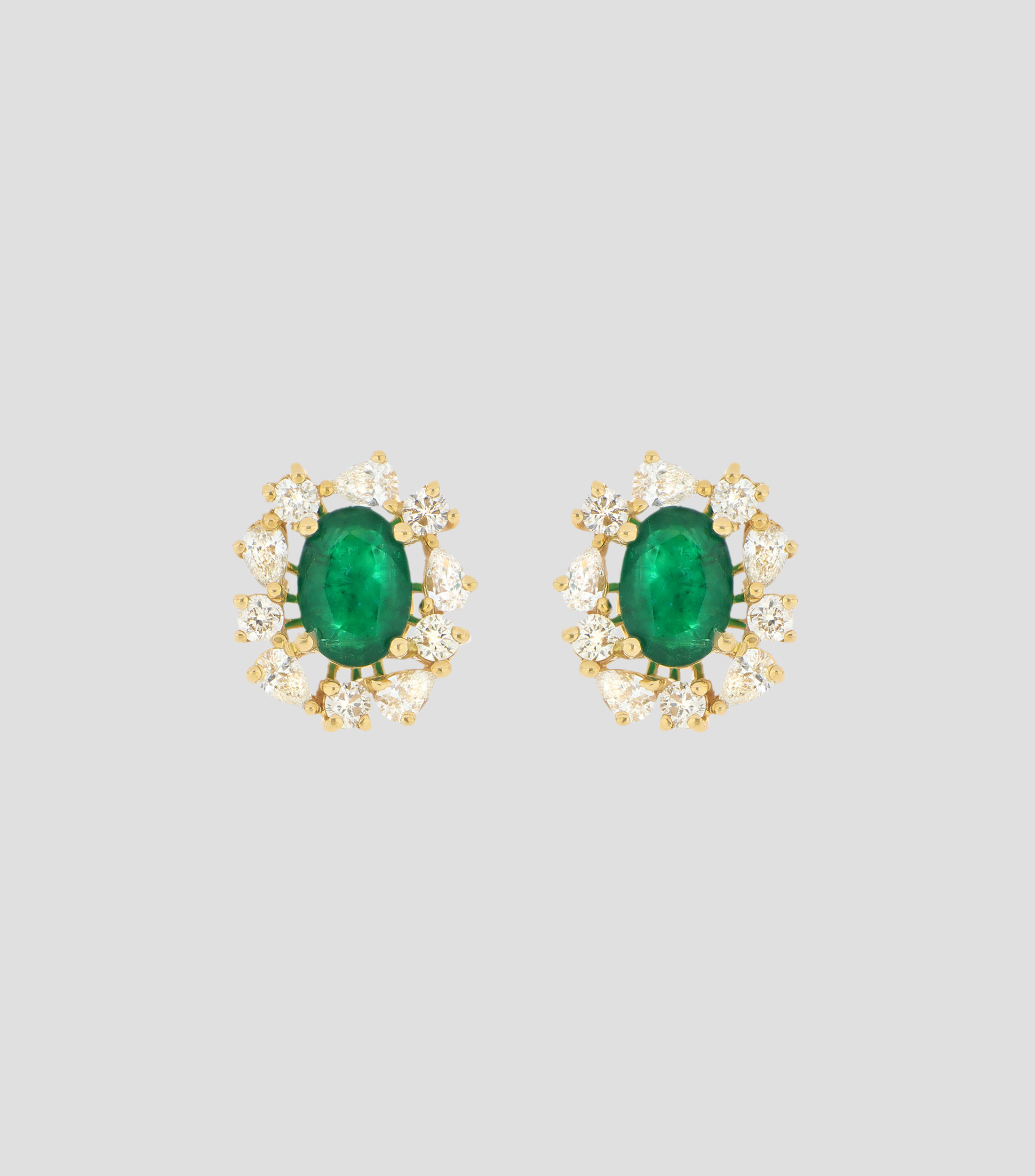 Broqueles en oro amarillo de 14 kilates con diamantes y esmeralda Mujer