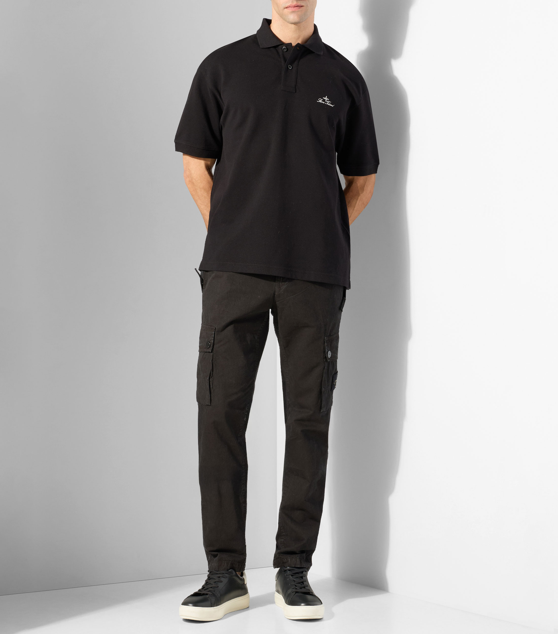 Playera tipo polo con manga corta lisa Hombre