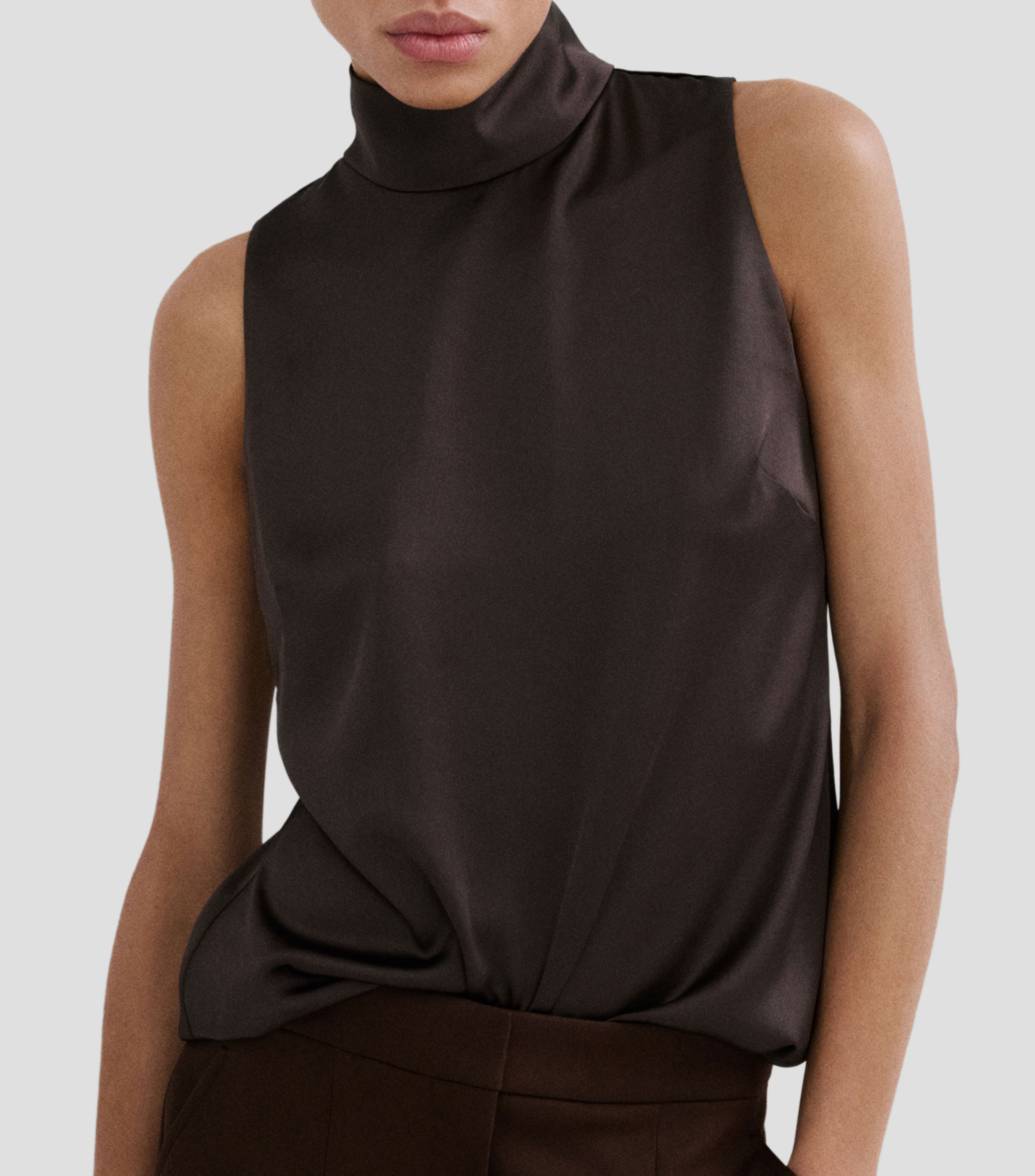 Blusa lisa sin mangas Mujer
