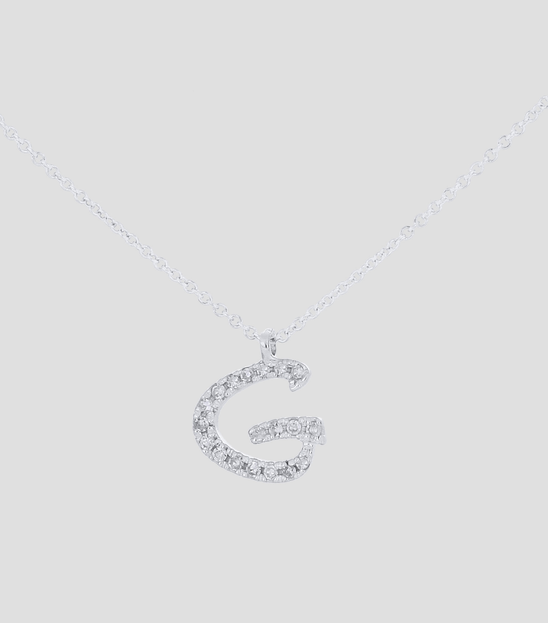 Dije en letra "G" y cadena en Oro blanco 14 Kts Mujer