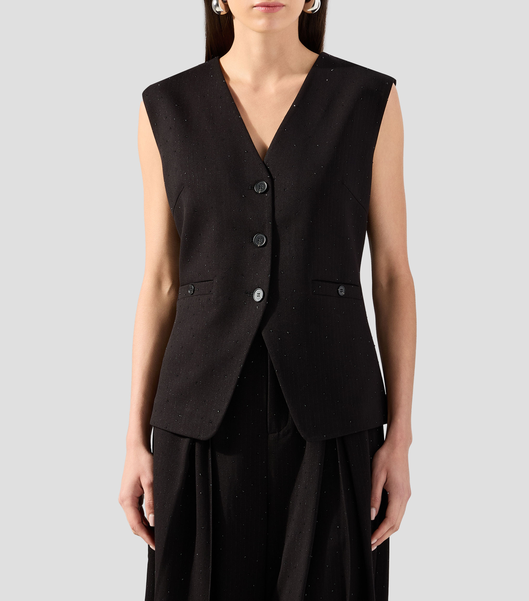 Chaleco con botonadura Mujer