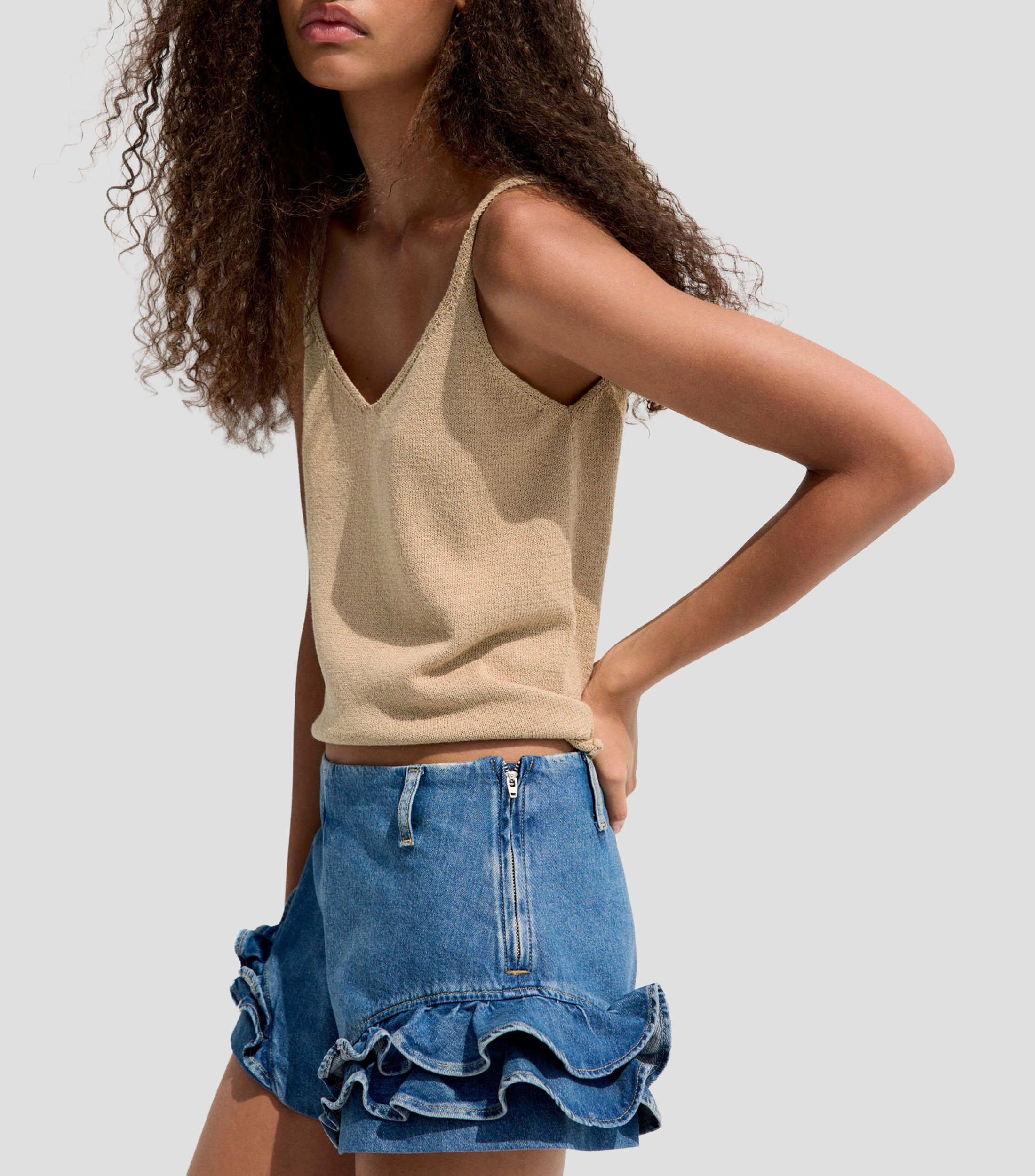 Top cuello V manga sin mangas liso Mujer