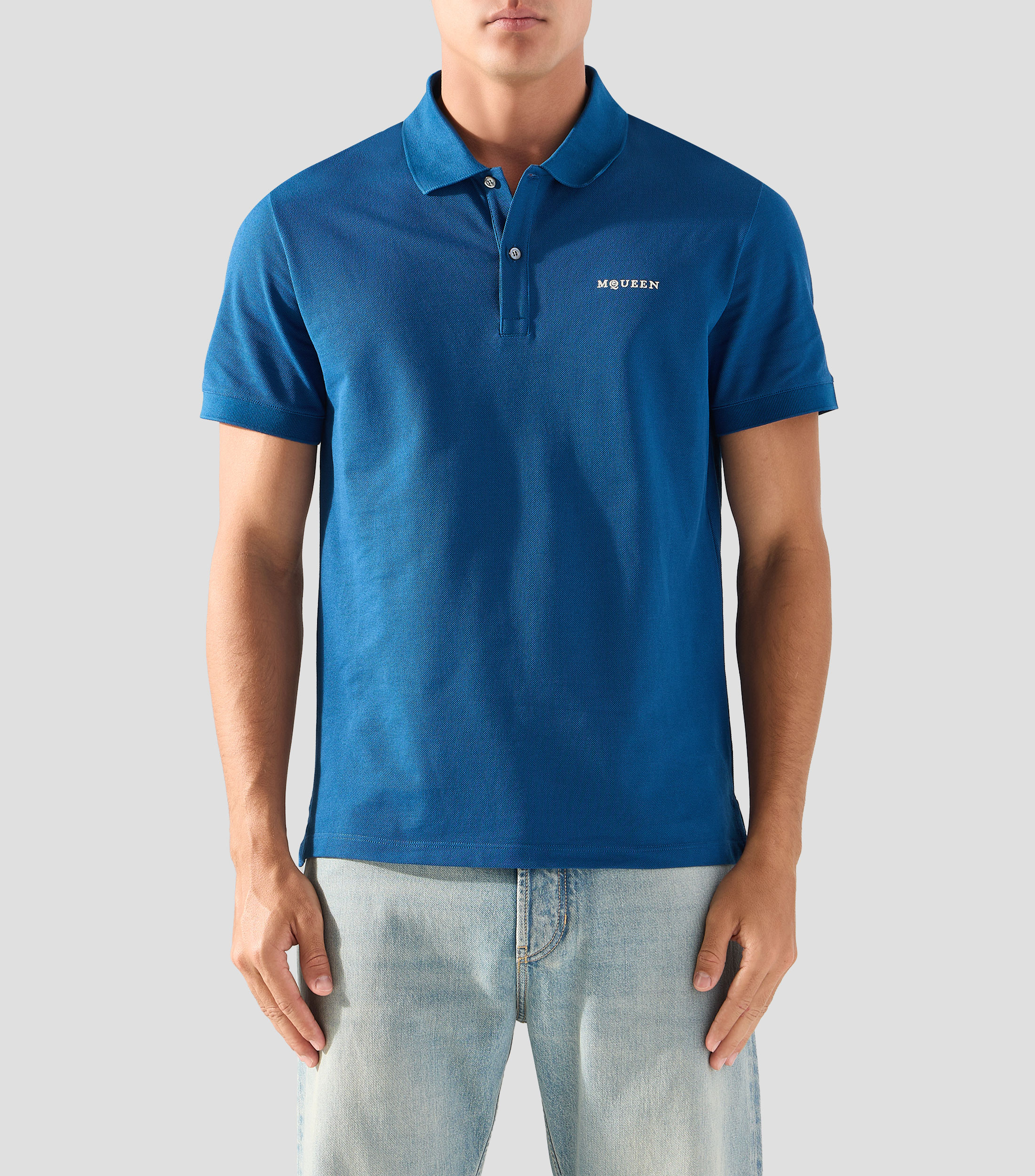 Playera tipo polo con manga corta lisa Hombre