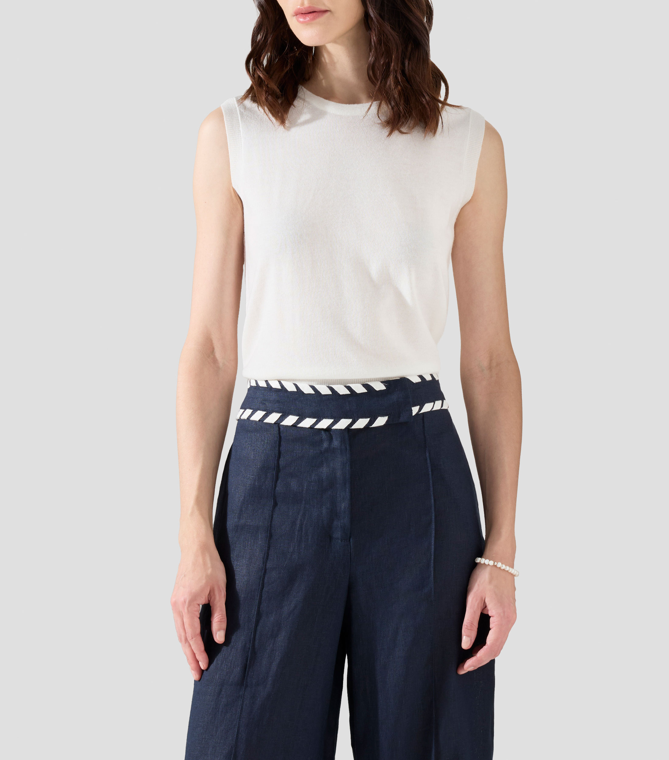 Blusa lisa sin mangas Mujer