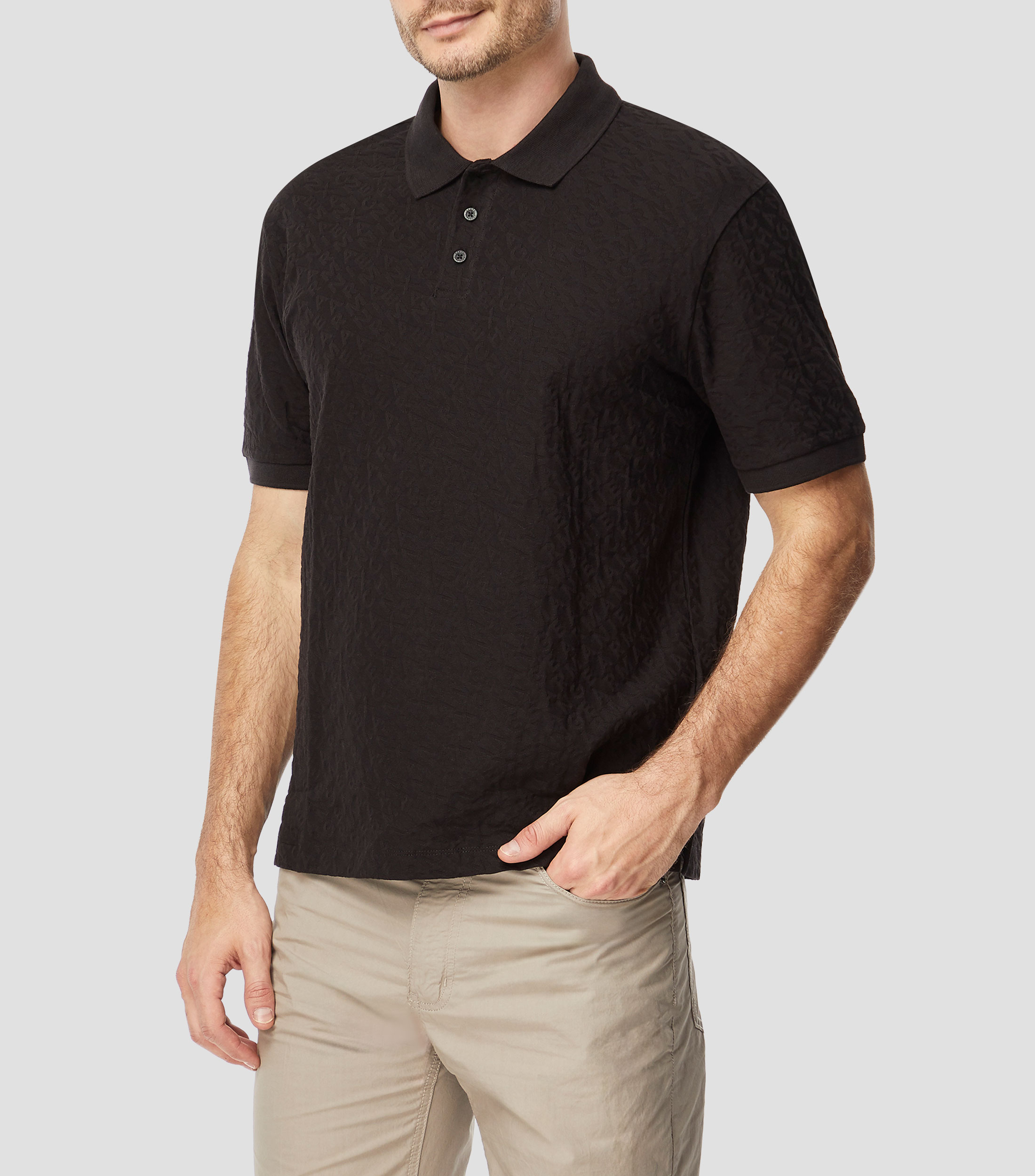 Playera tipo polo con manga corta lisa Hombre