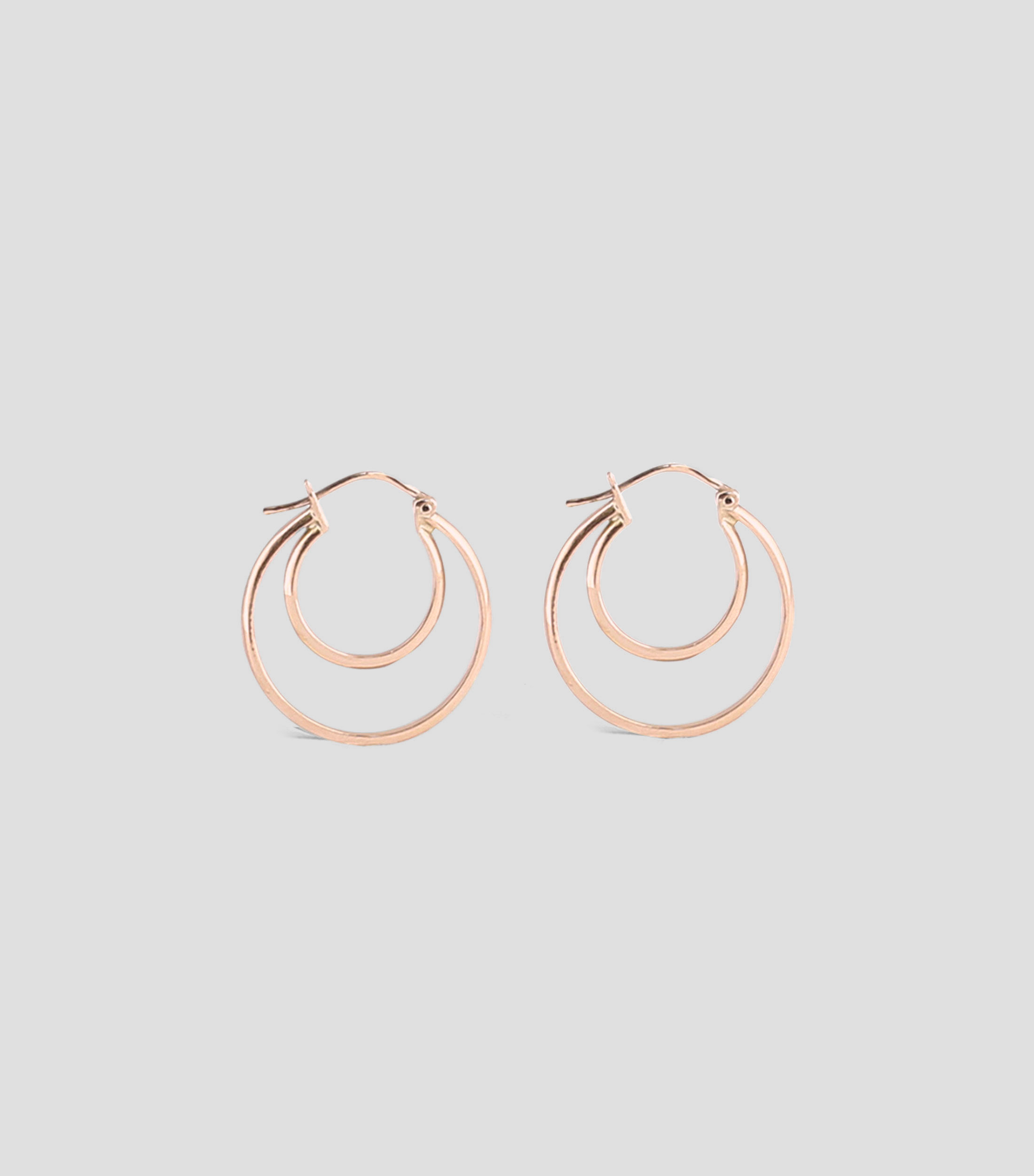 Aretes en oro rosa de 14 kilates con doble arracada Paulina Mujer