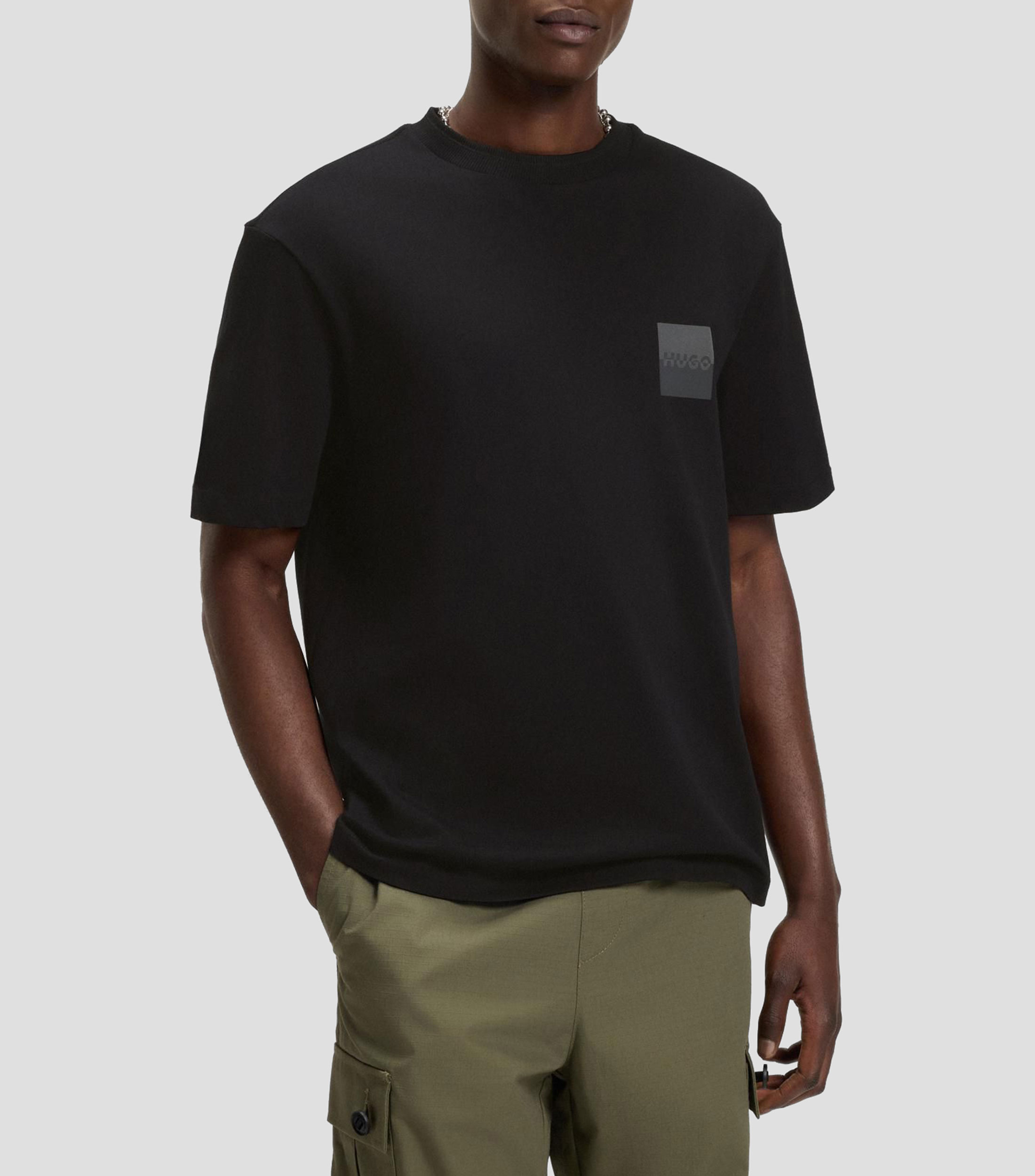 Playera relaxed fit de algodón con logos en dos partes Hombre