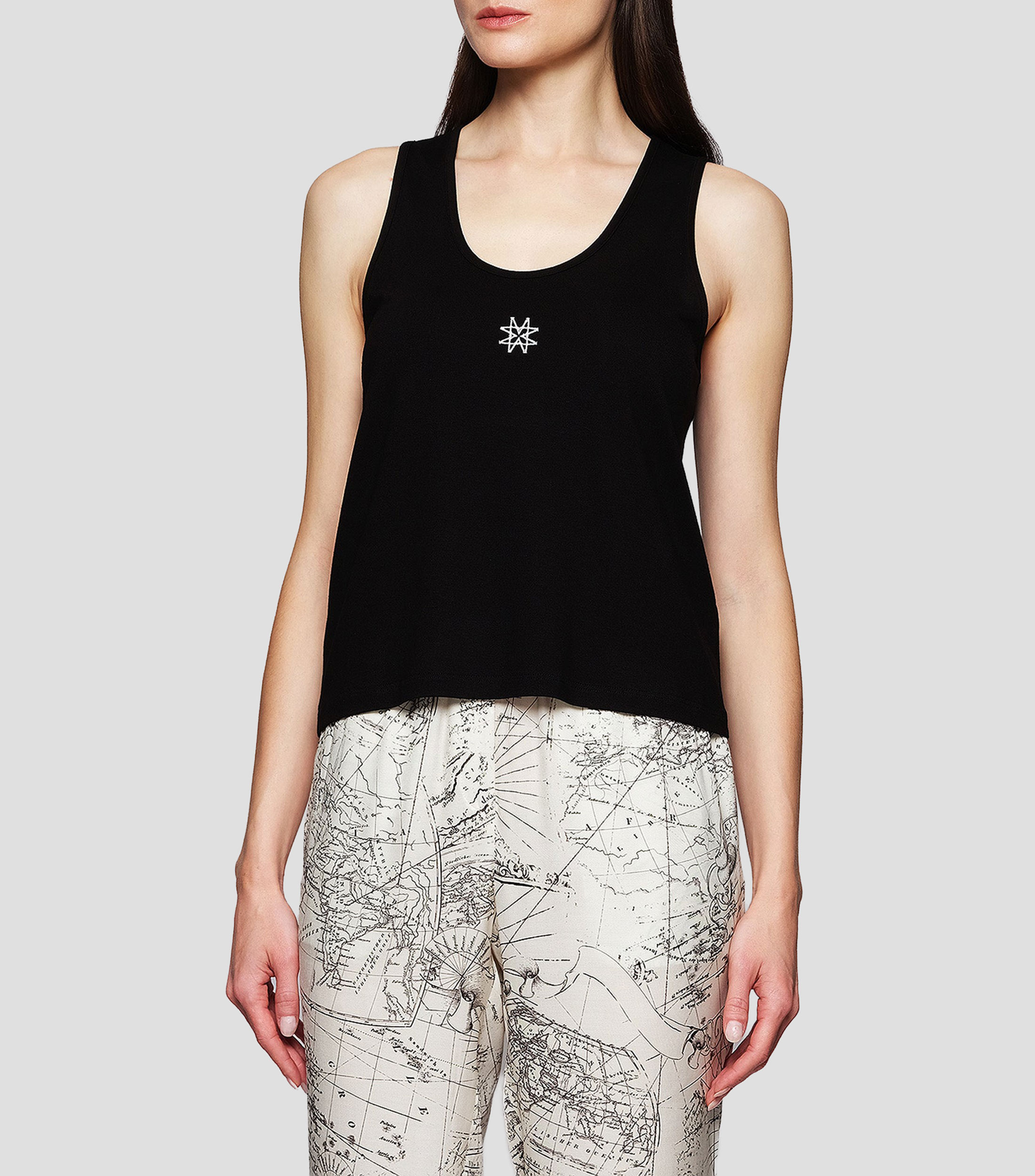 Blusa lisa sin mangas Mujer