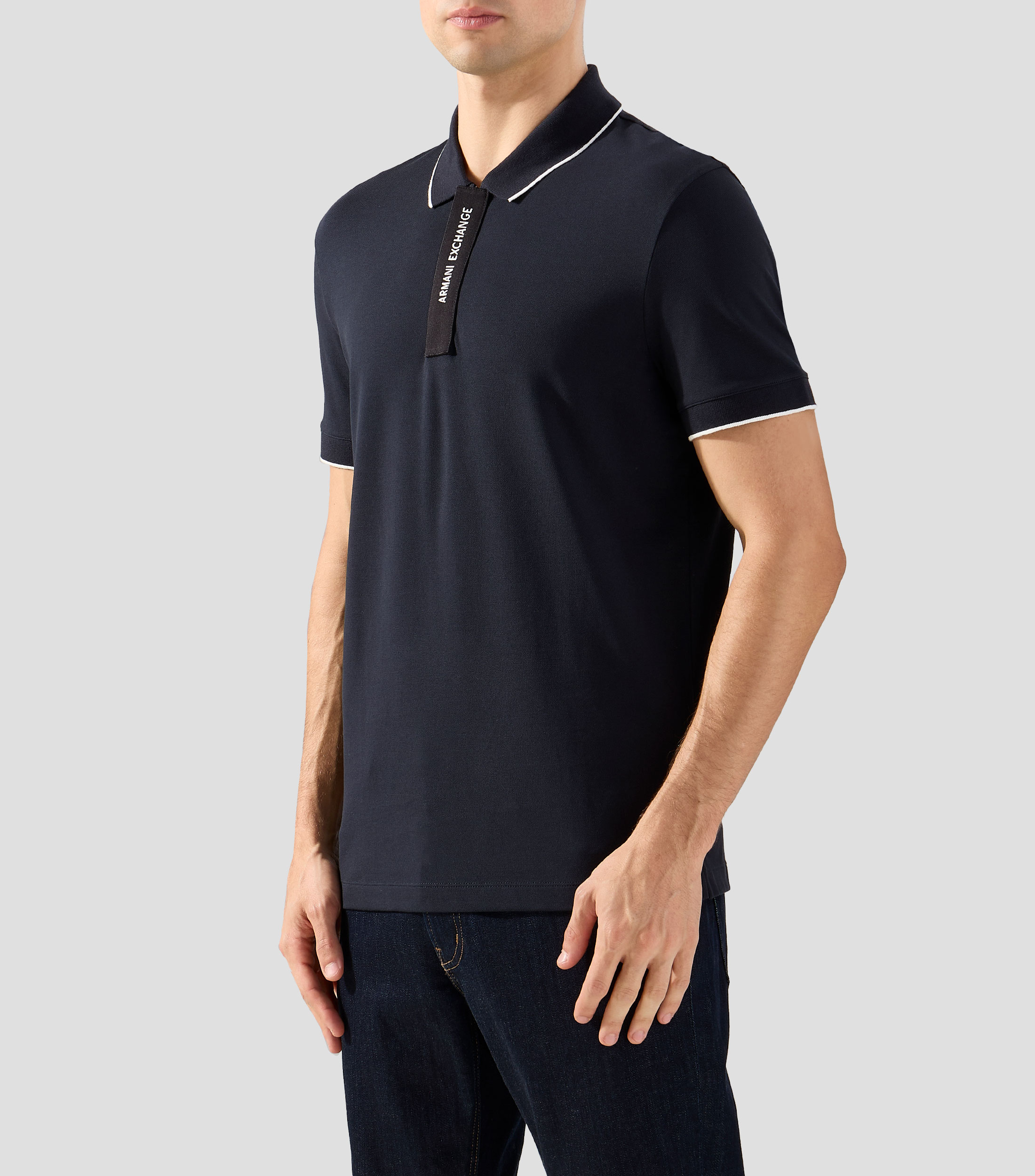 Playera tipo polo con manga corta lisa Hombre