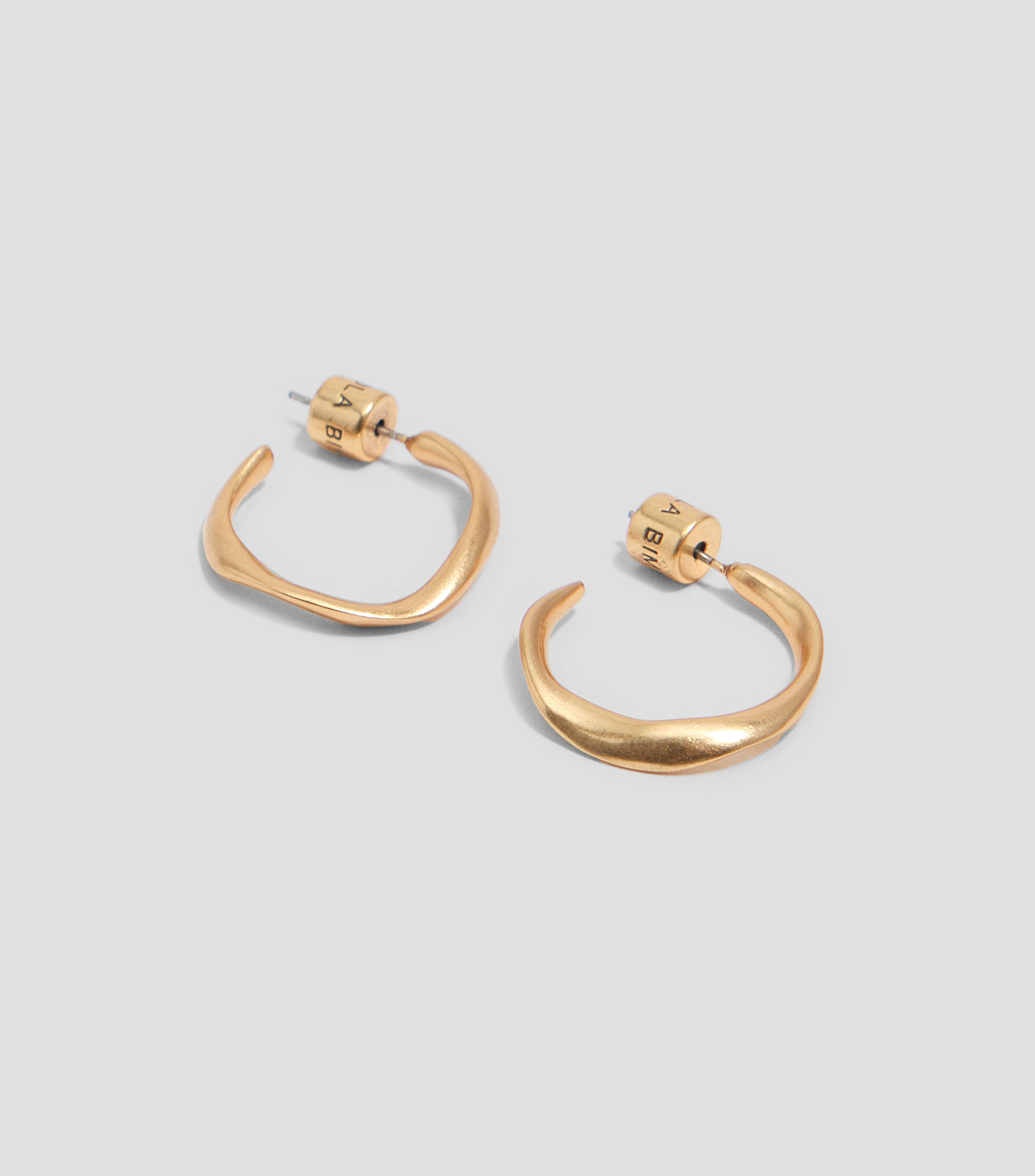 Aretes aro pequeño irregular dorado mate Mujer