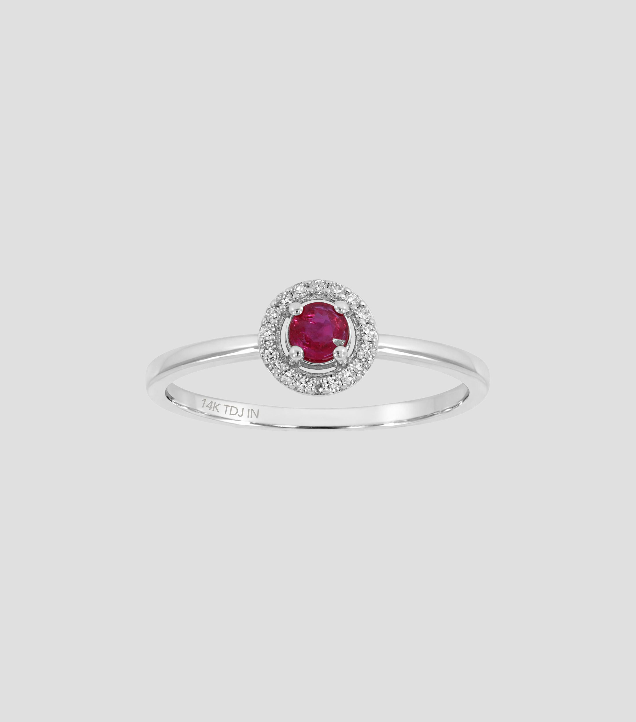 Anillo en oro blanco de 14 Kilates con brillantes y rubí Mujer