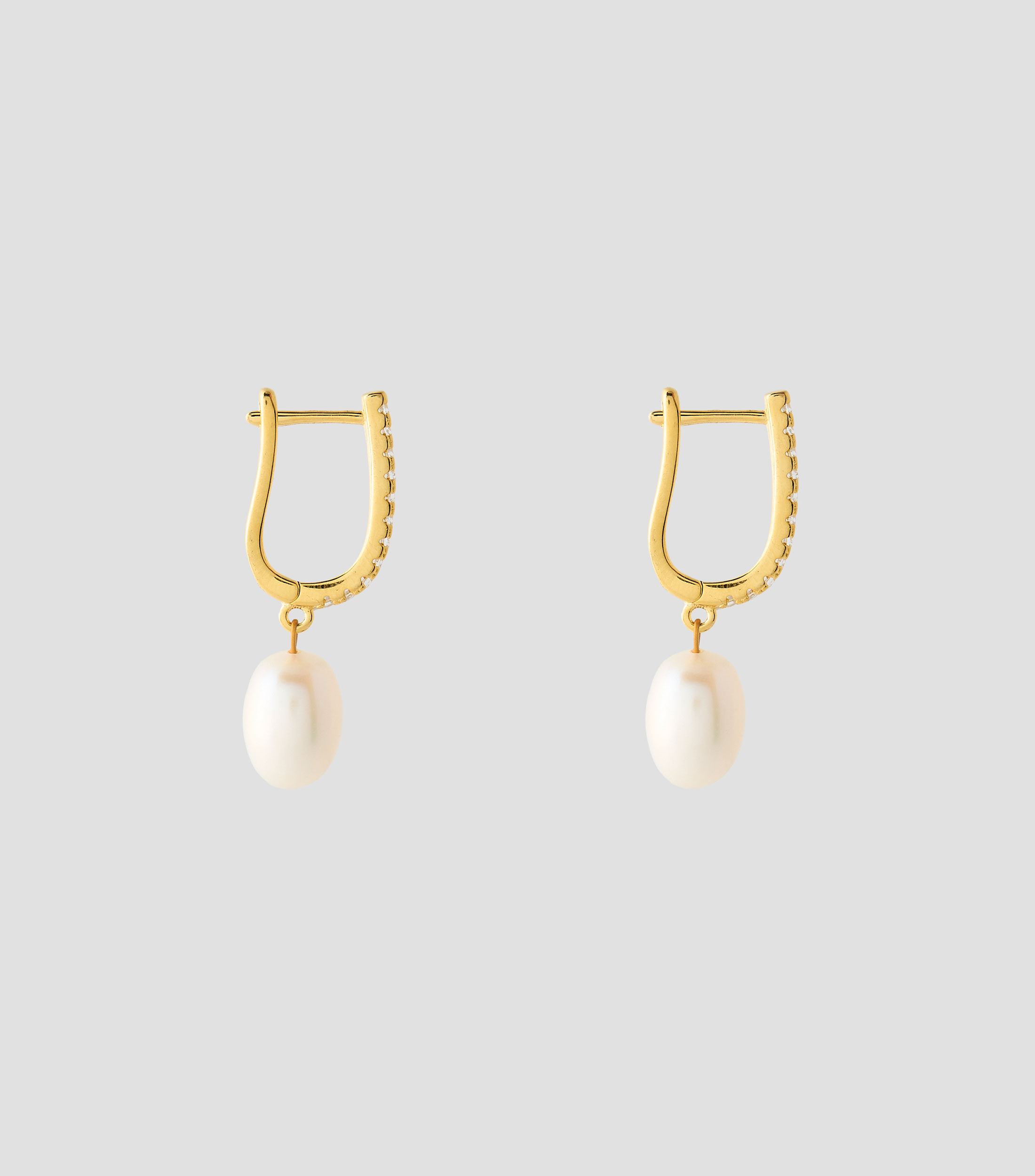 Aretes ovalados con perla Mujer