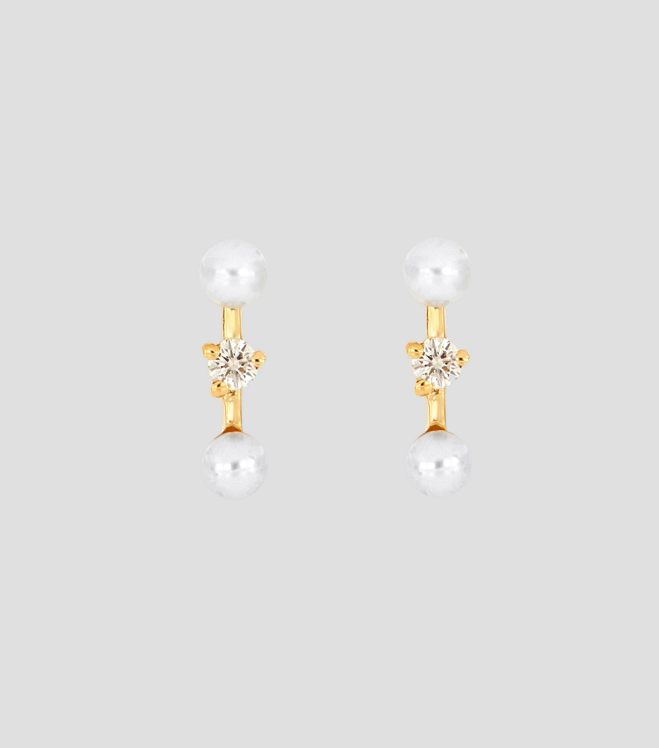 Aretes en oro amarillo de 18 Kts con perlas Mujer