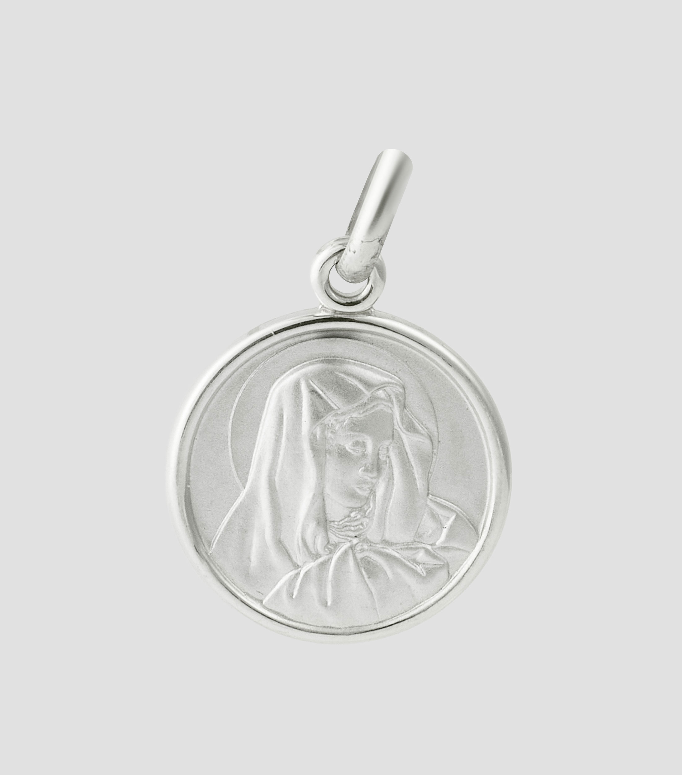 Dije en oro blanco de 14 kilates Virgen Dolorosa Mujer