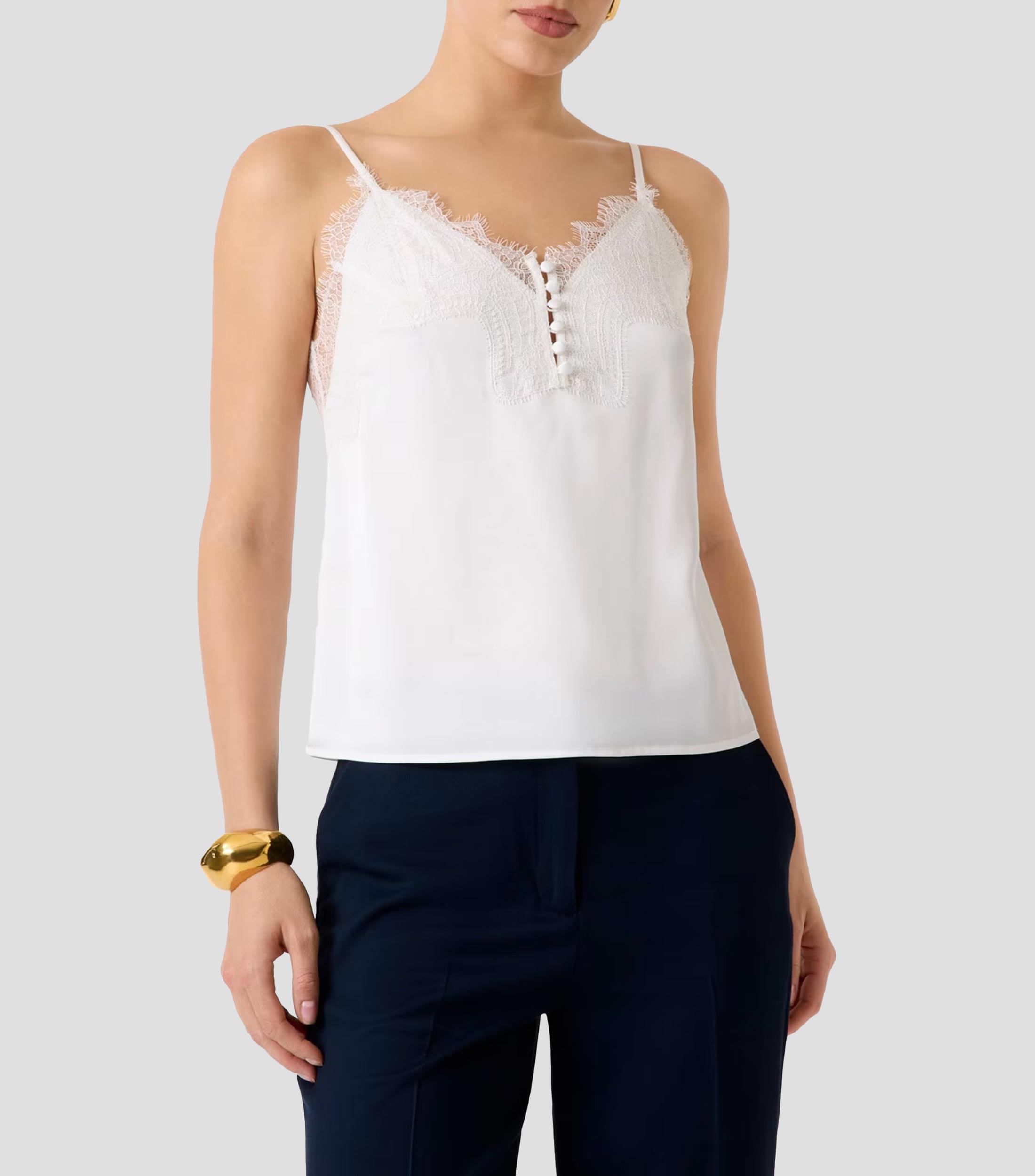 Blusa lisa sin mangas Mujer