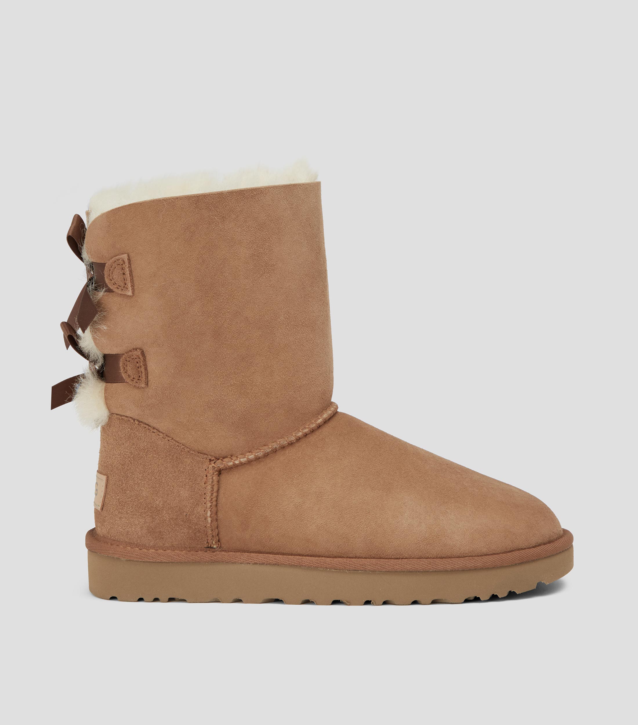 Ugg: Botas Bailey Bow cafés piel Mujer | El Palacio de Hierro