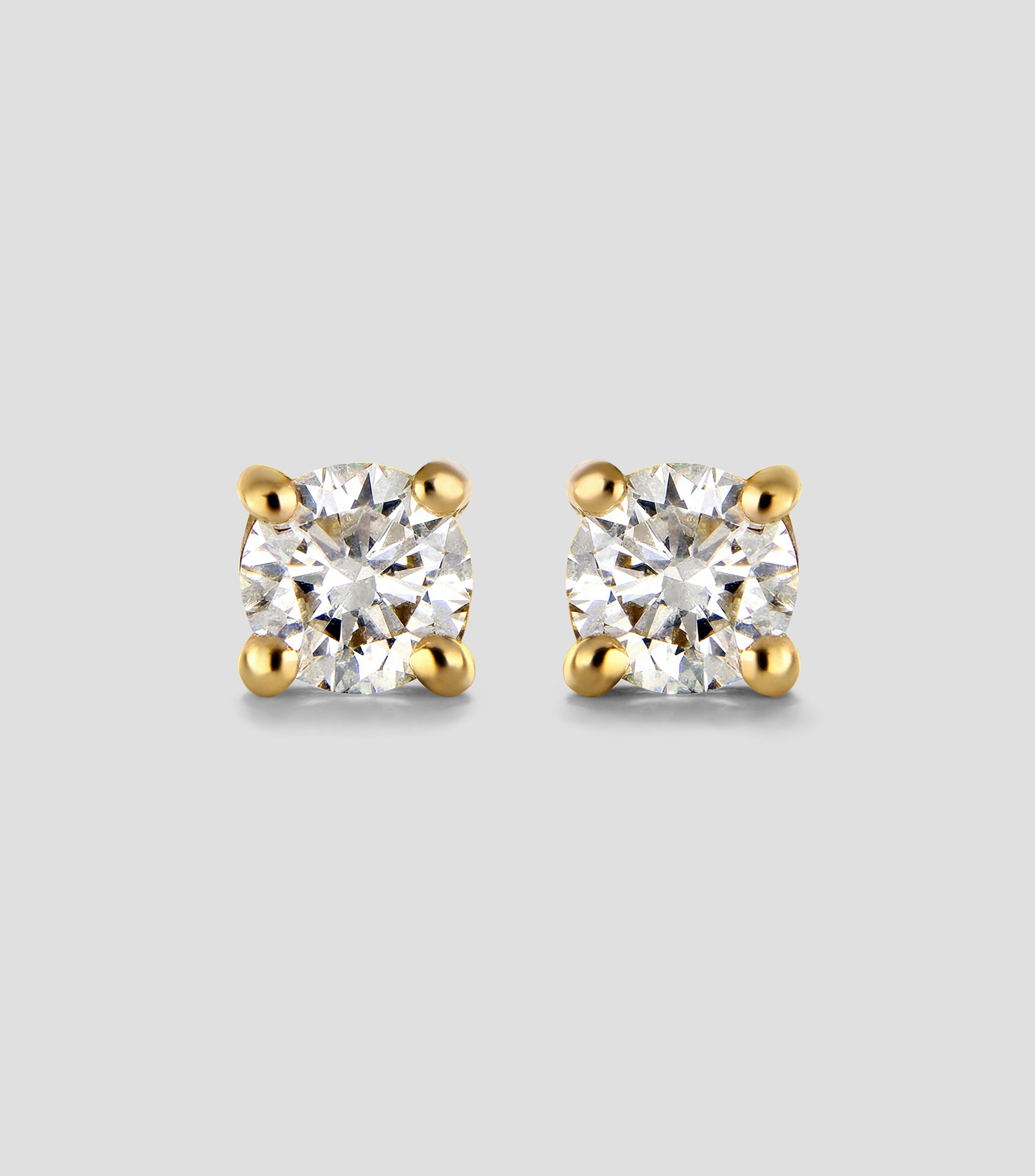 Broqueles en oro amarillo de 18 kilates con diamantes Mujer